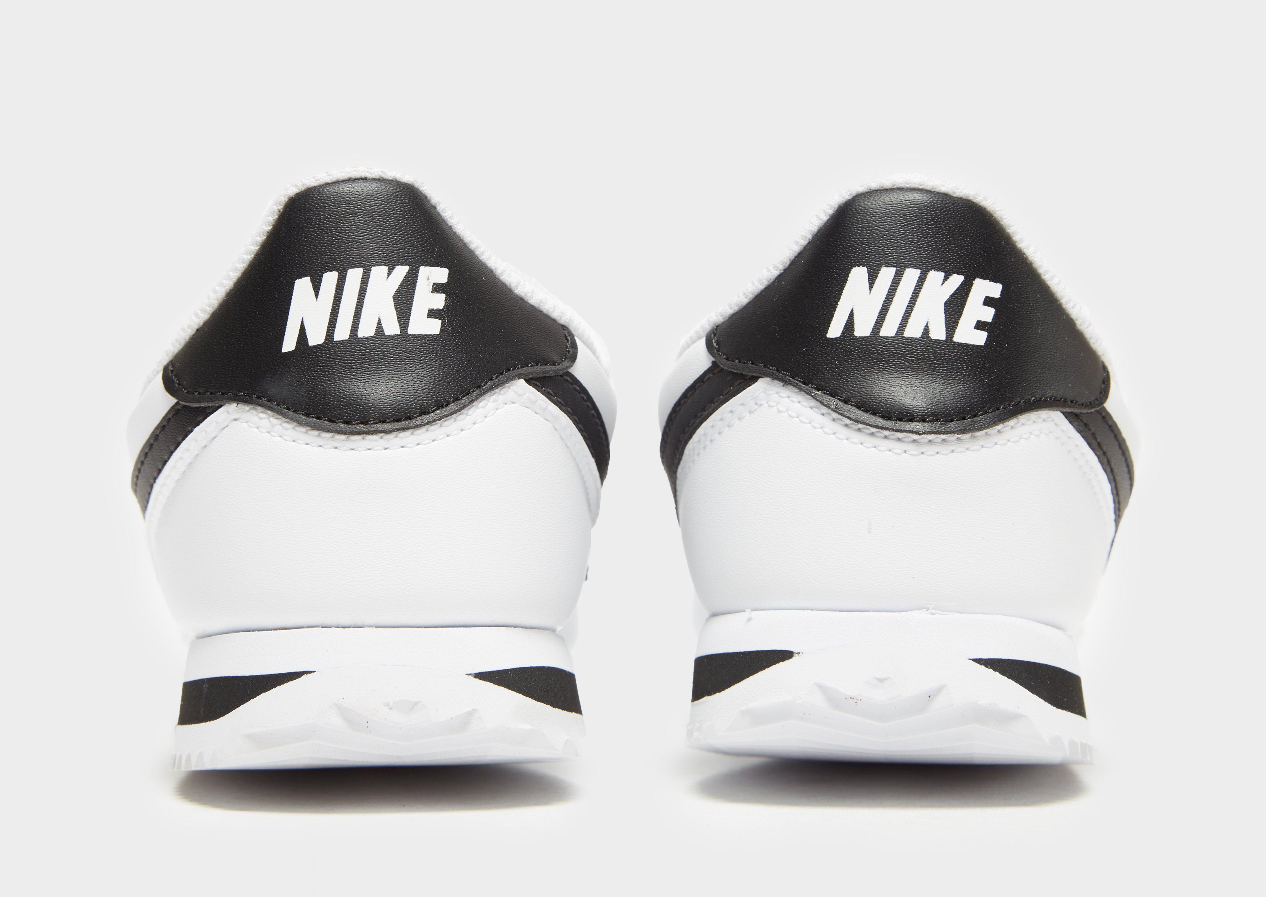 white nike cortez junior