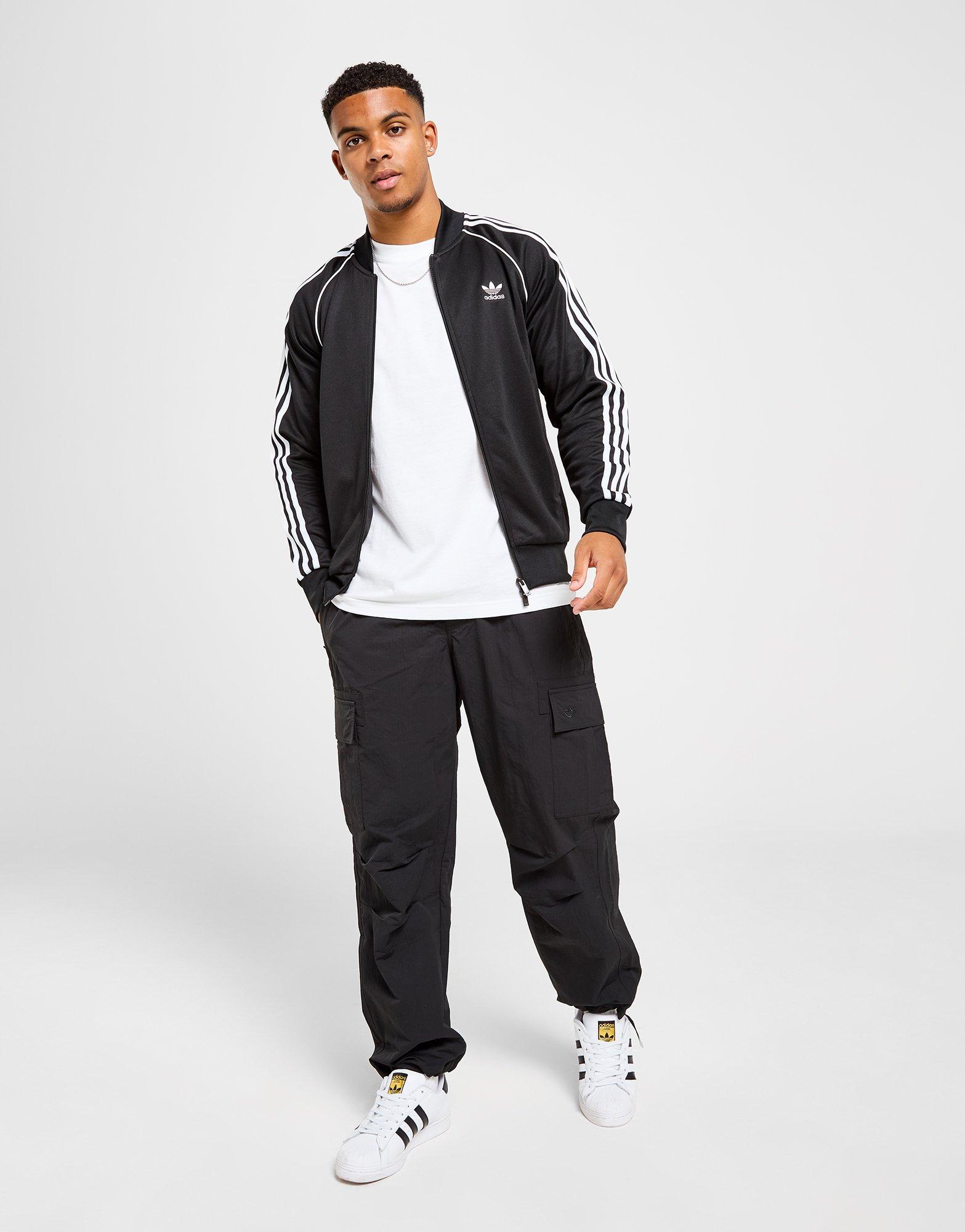 Compra adidas Originals chaqueta de chándal Superstar en Negro