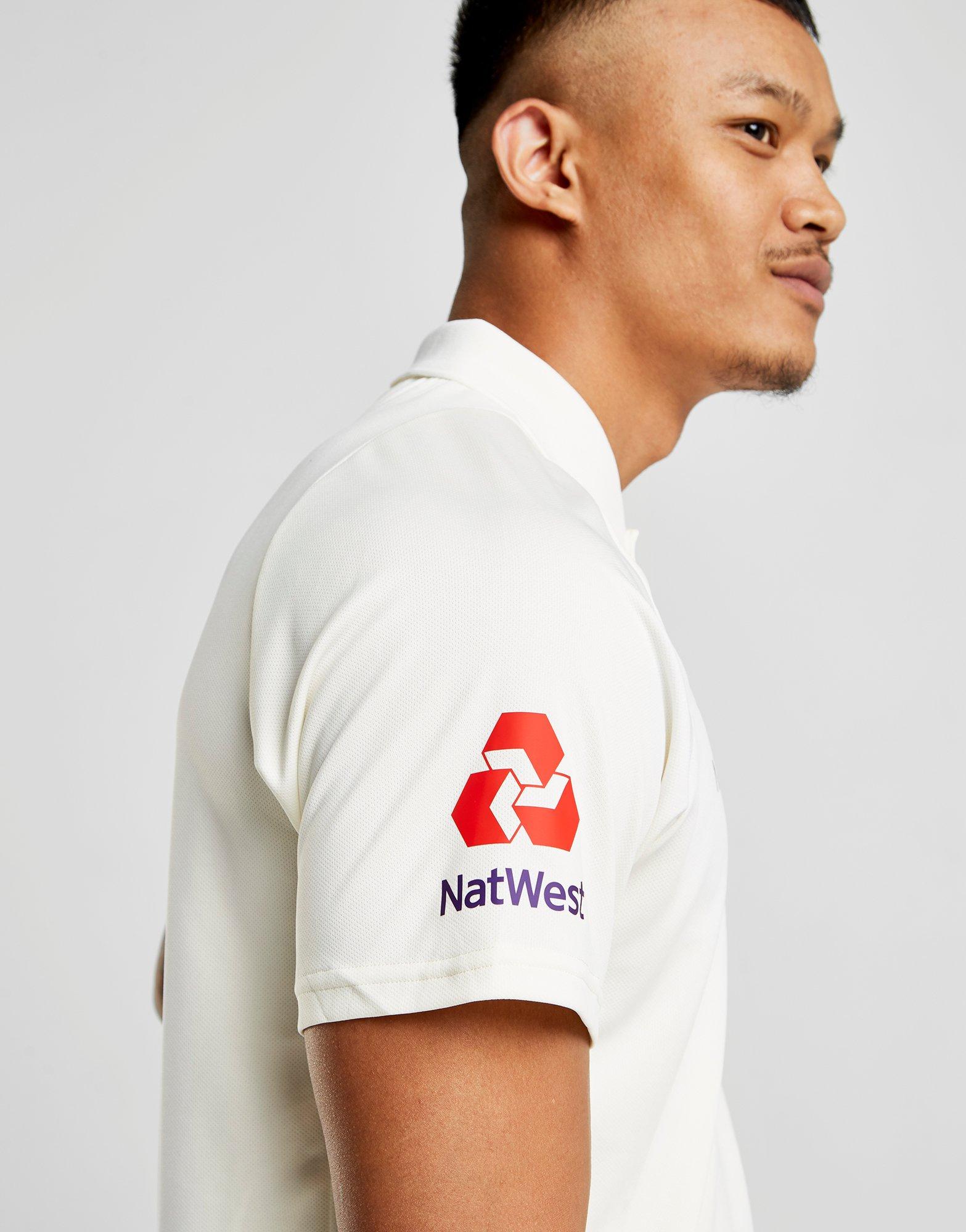 new balance ecb polo shirt