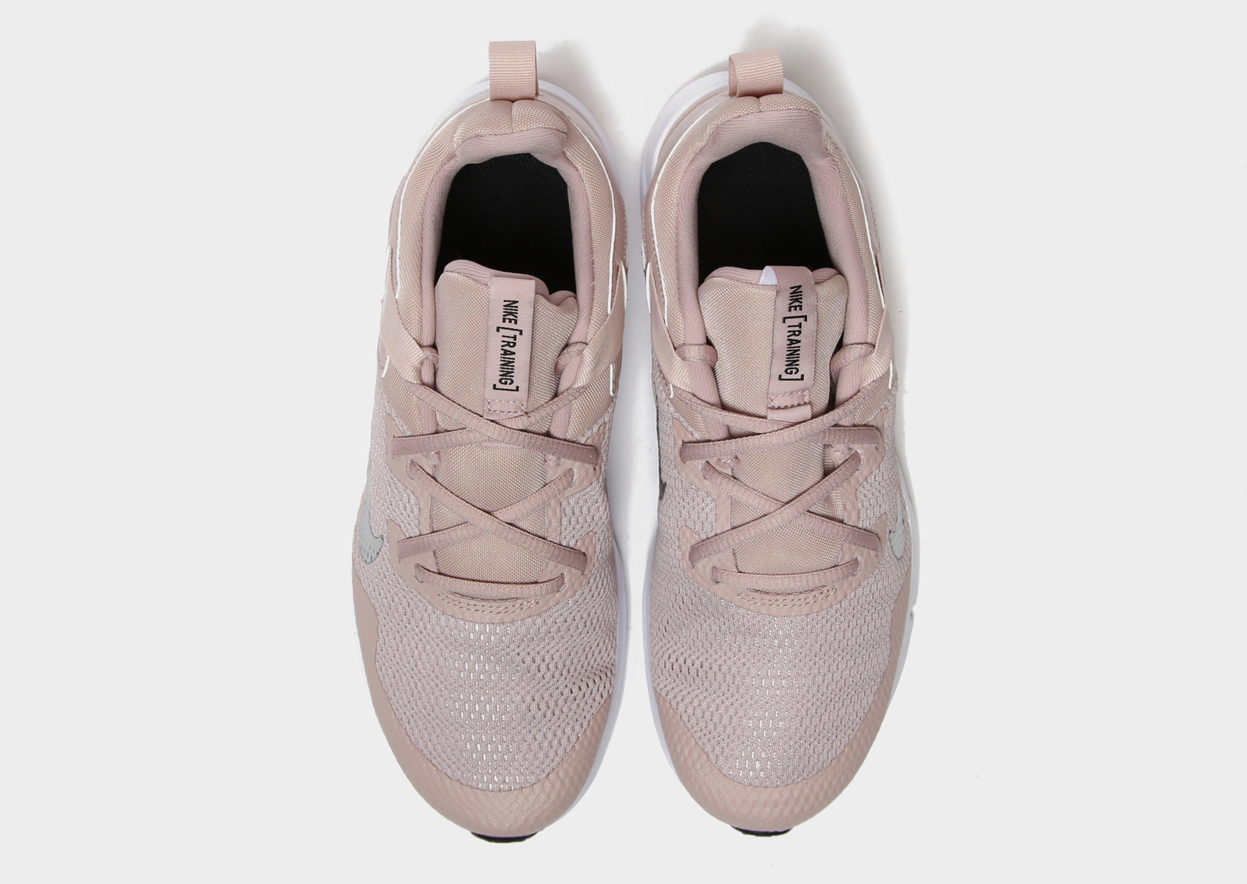 nike pink legend trainers