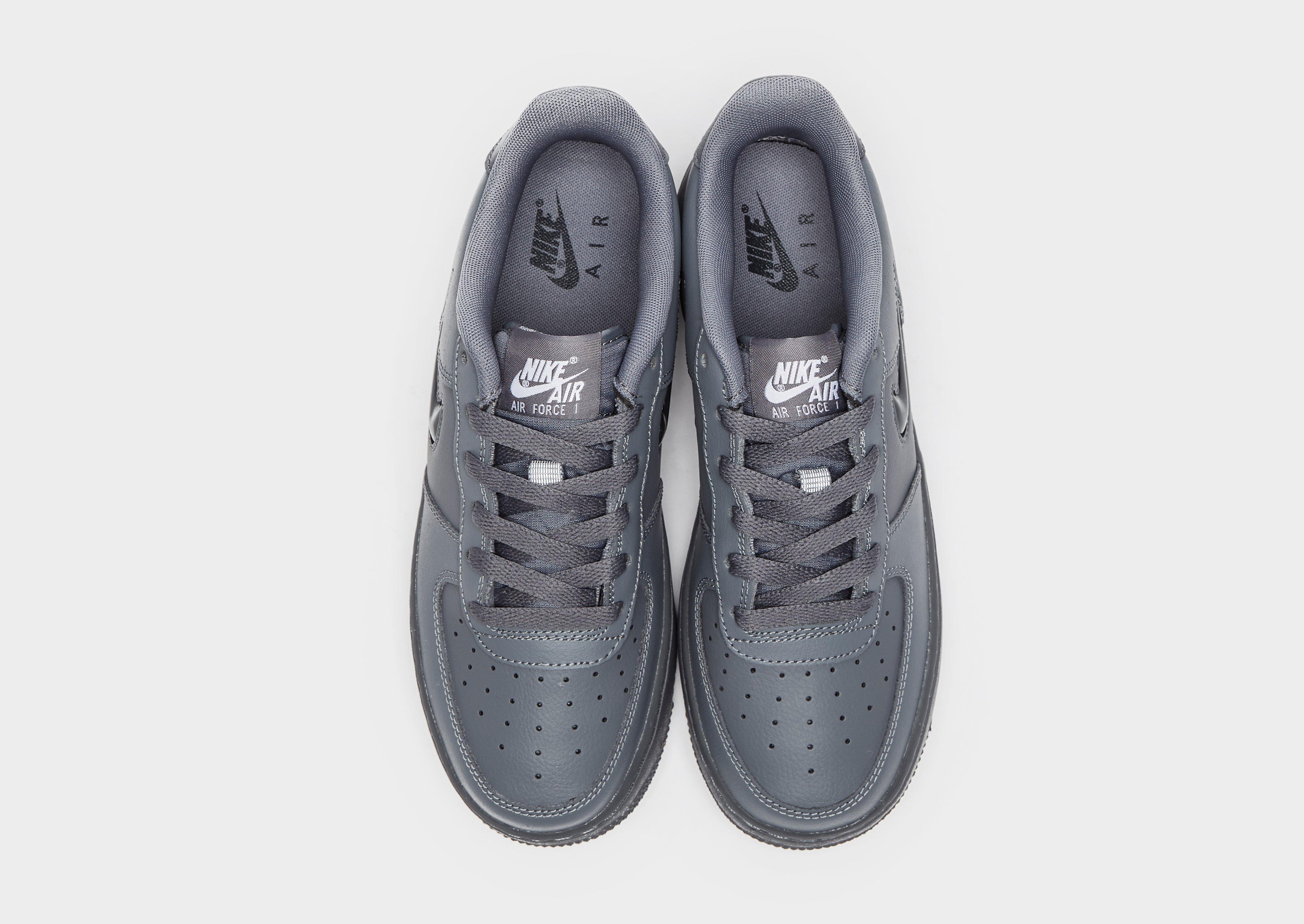 grey nike air force junior