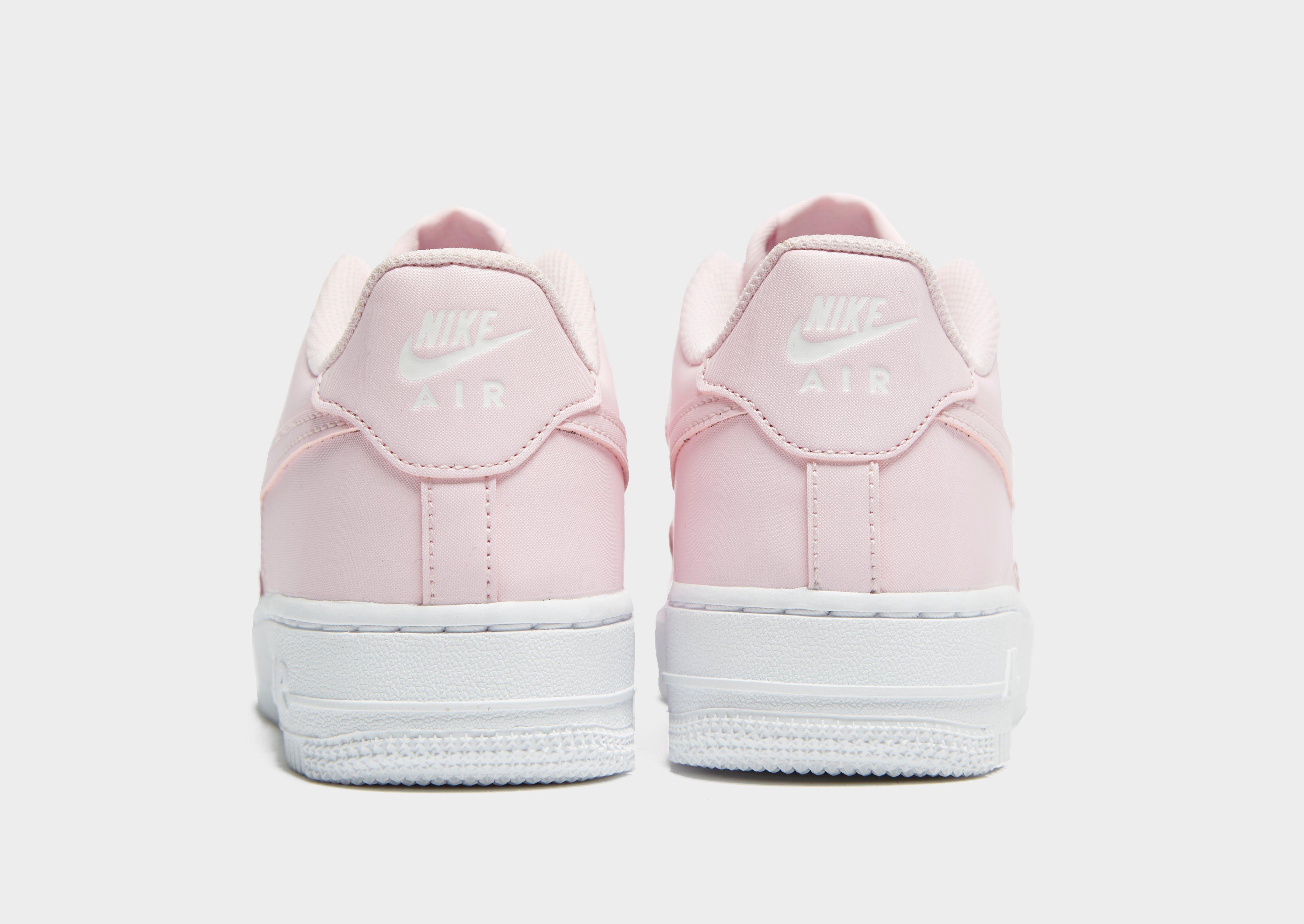 pink nike air force 1 junior