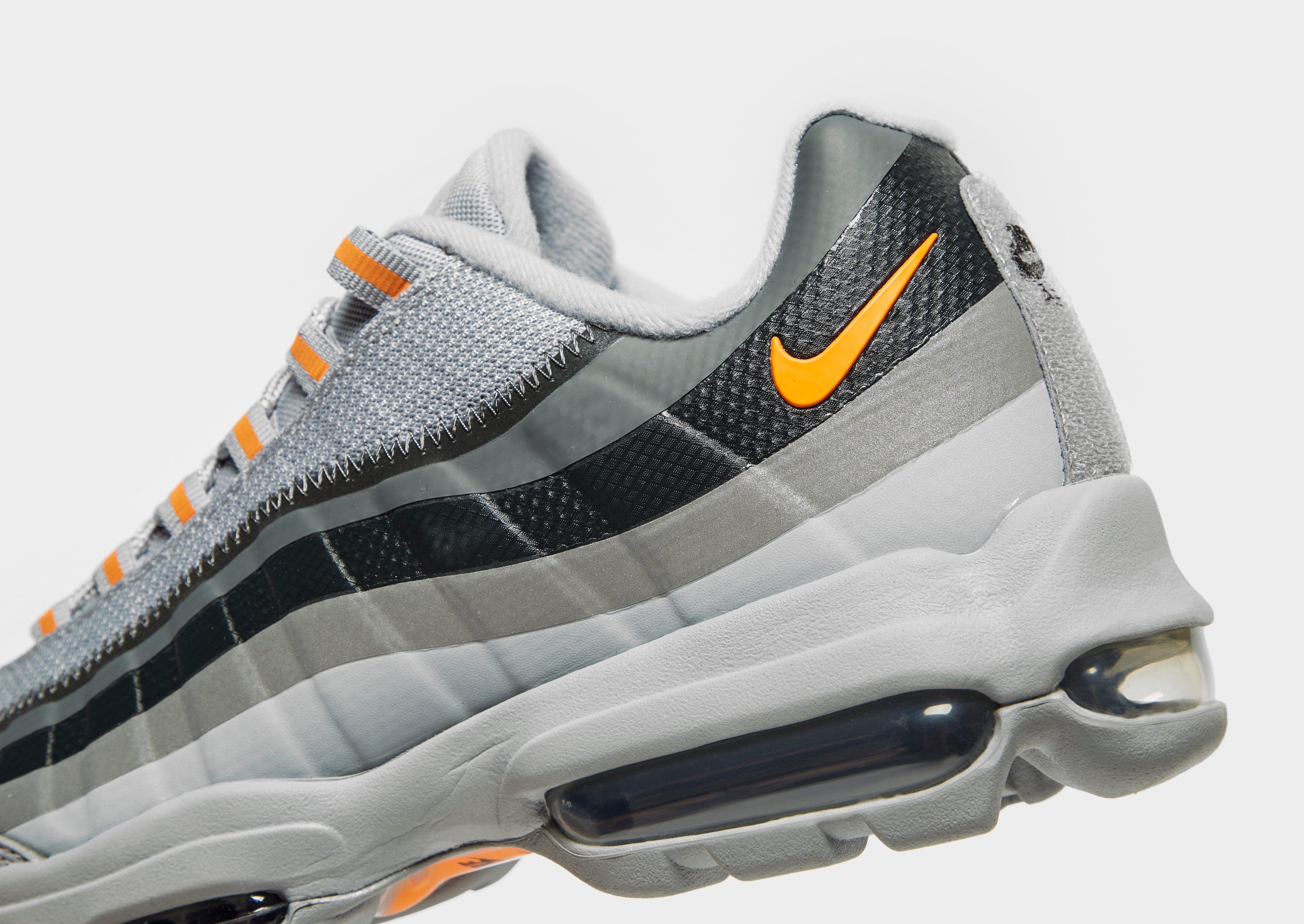 gray and orange air max