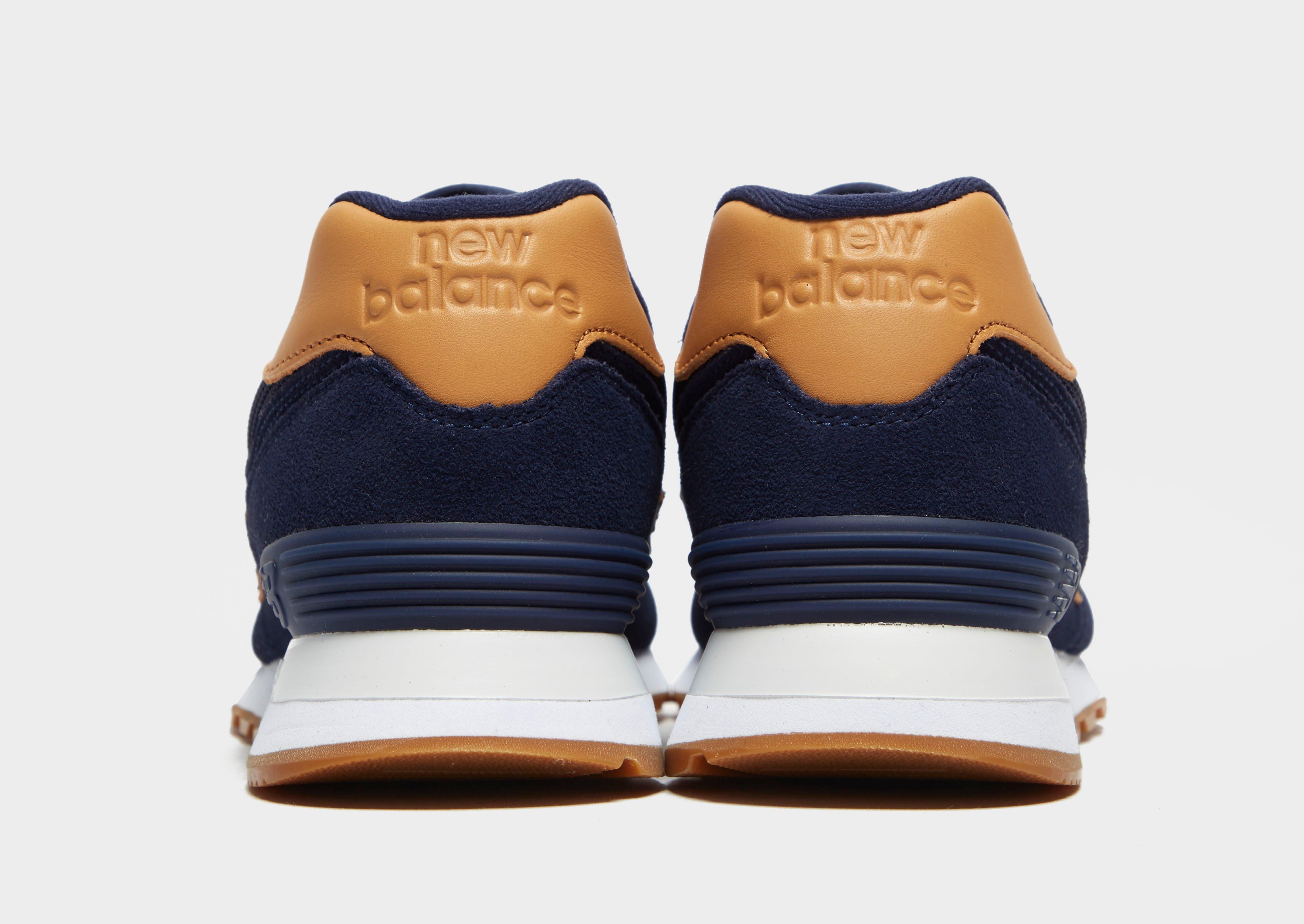 new balance azul y marron