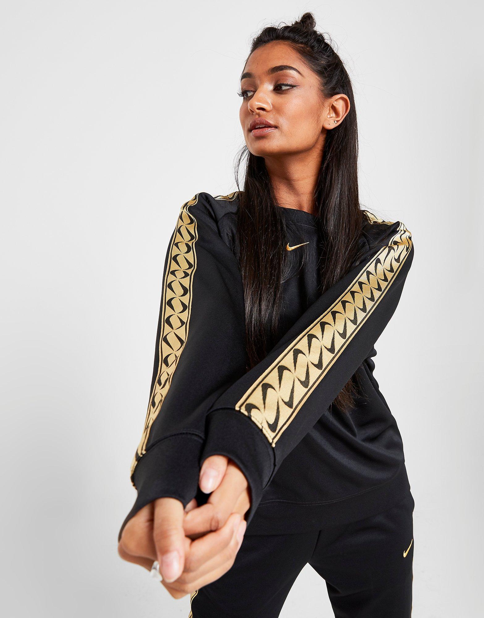 black nike sweatshirt with gold swoosh