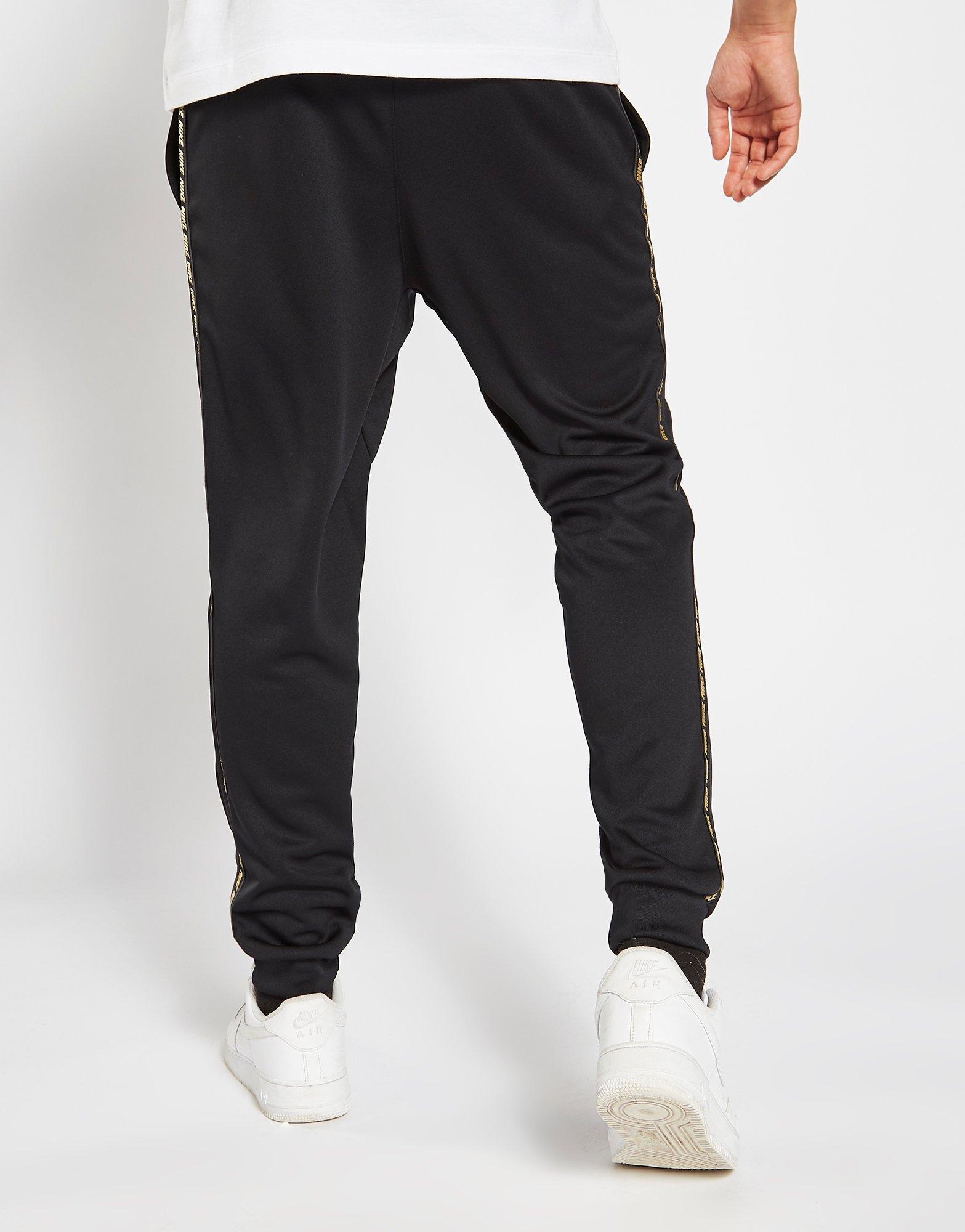 jordan poly tape track pants