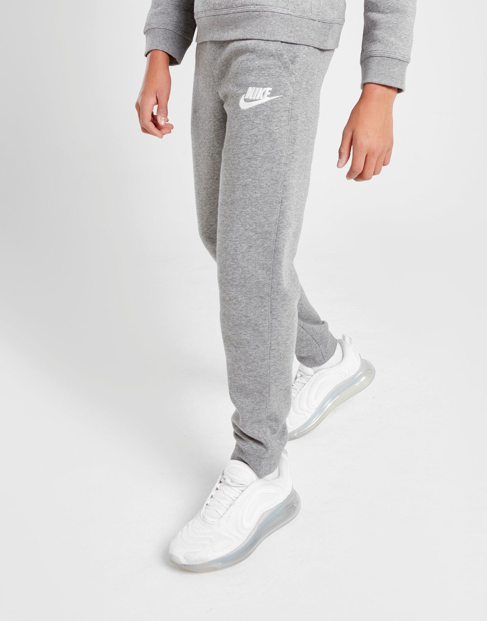 grey and white nike joggers