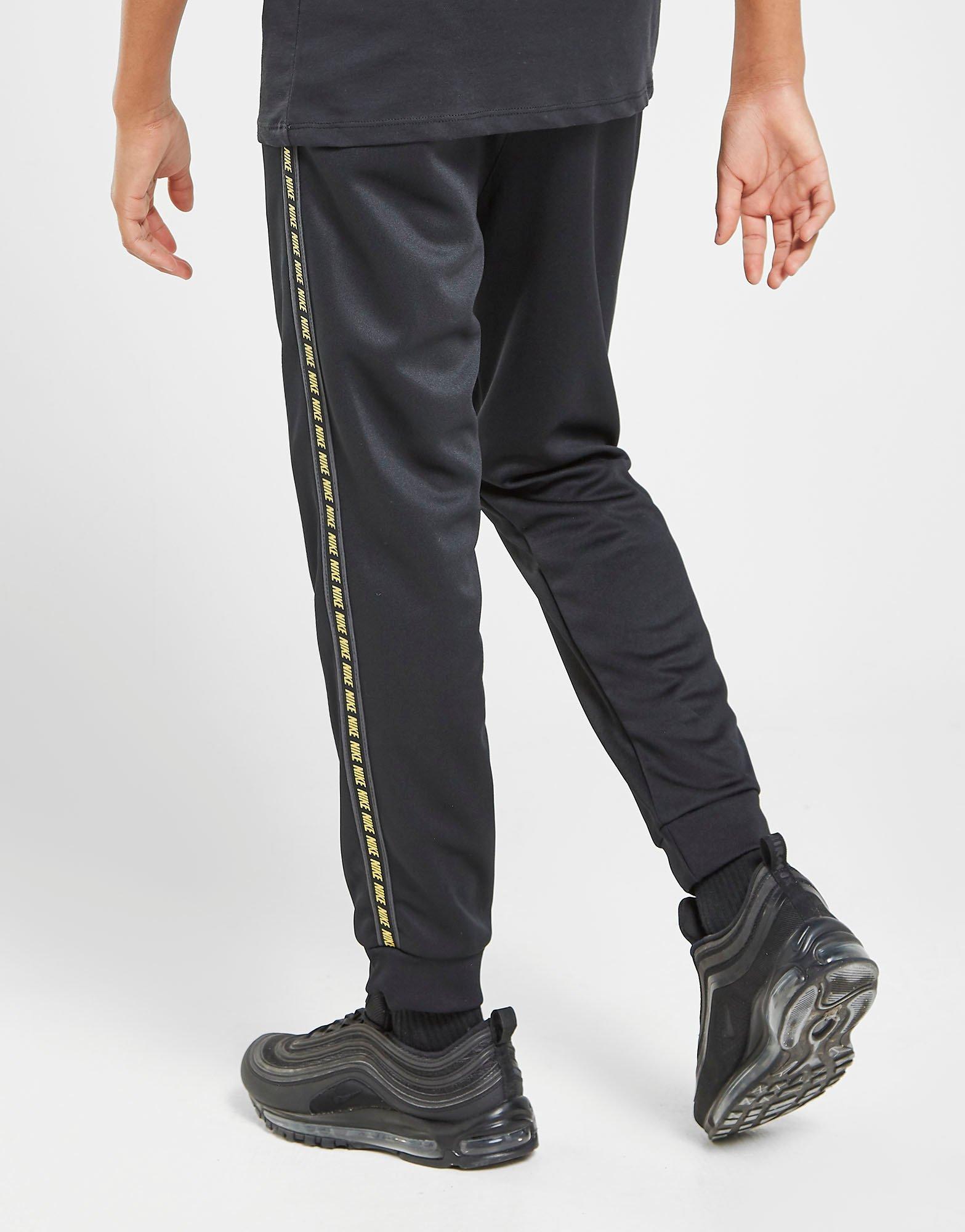 nike pantaloni taped poly track