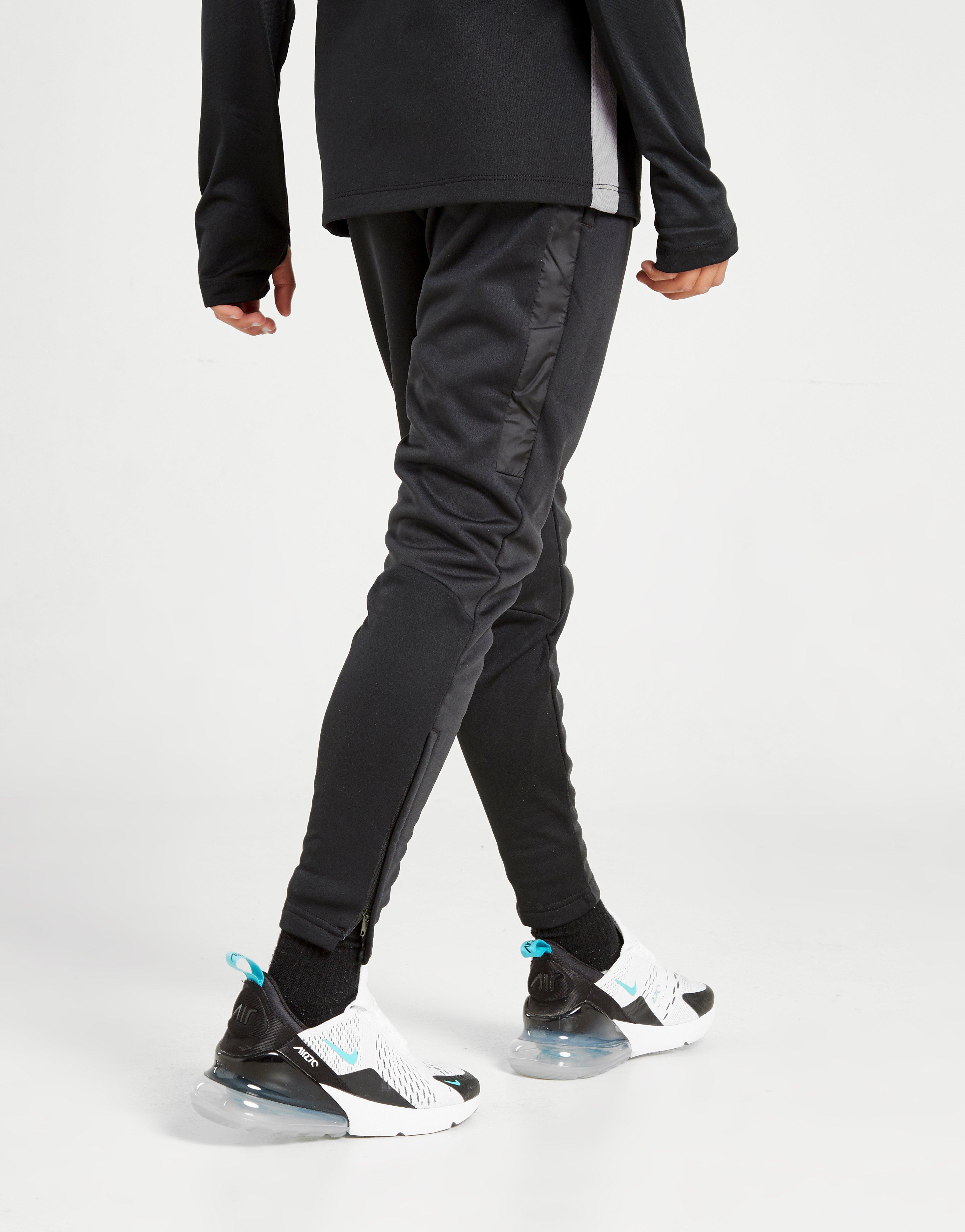 nike therma track pants