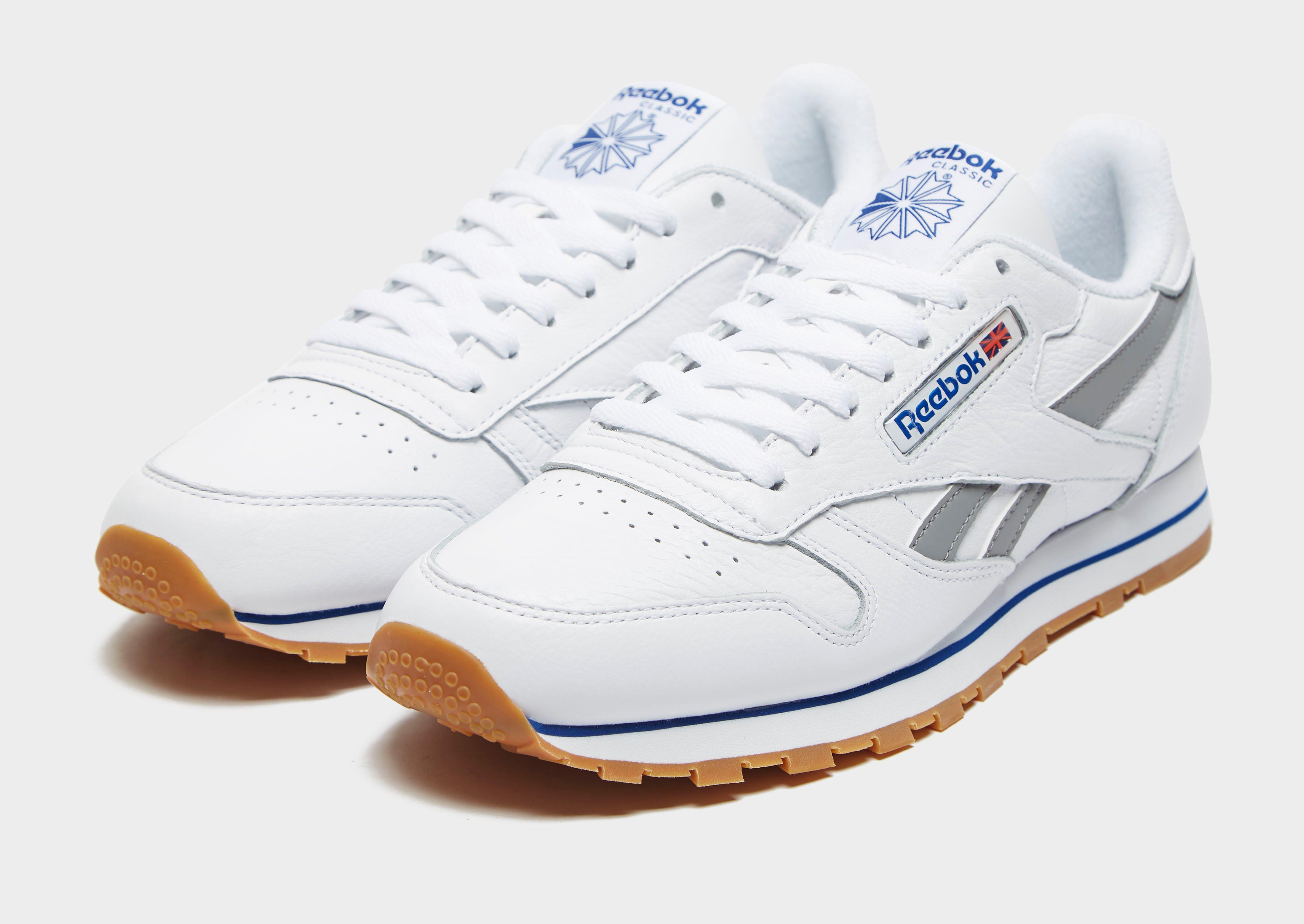 reebok classic with blue sole