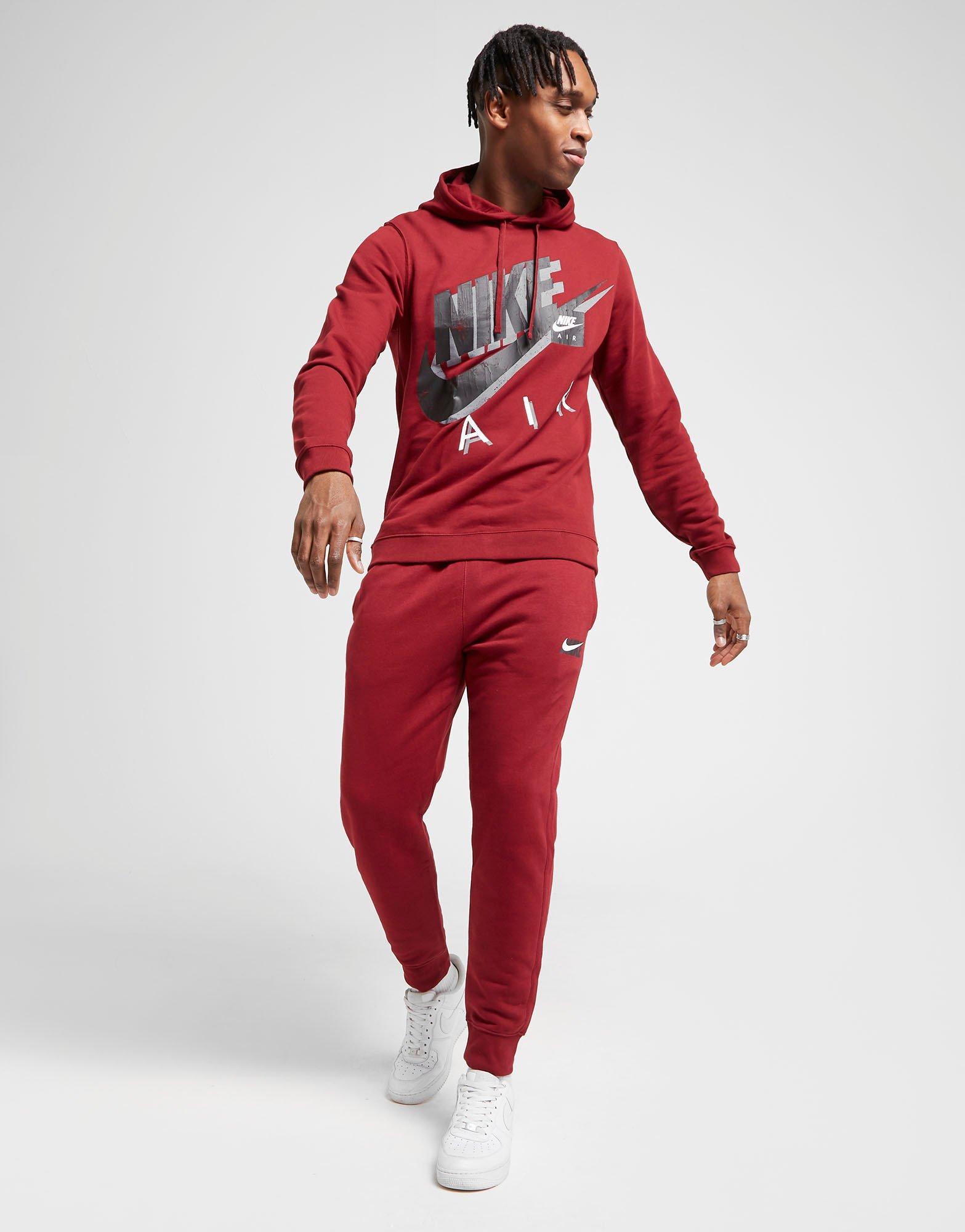 red nike hoodie and sweatpants