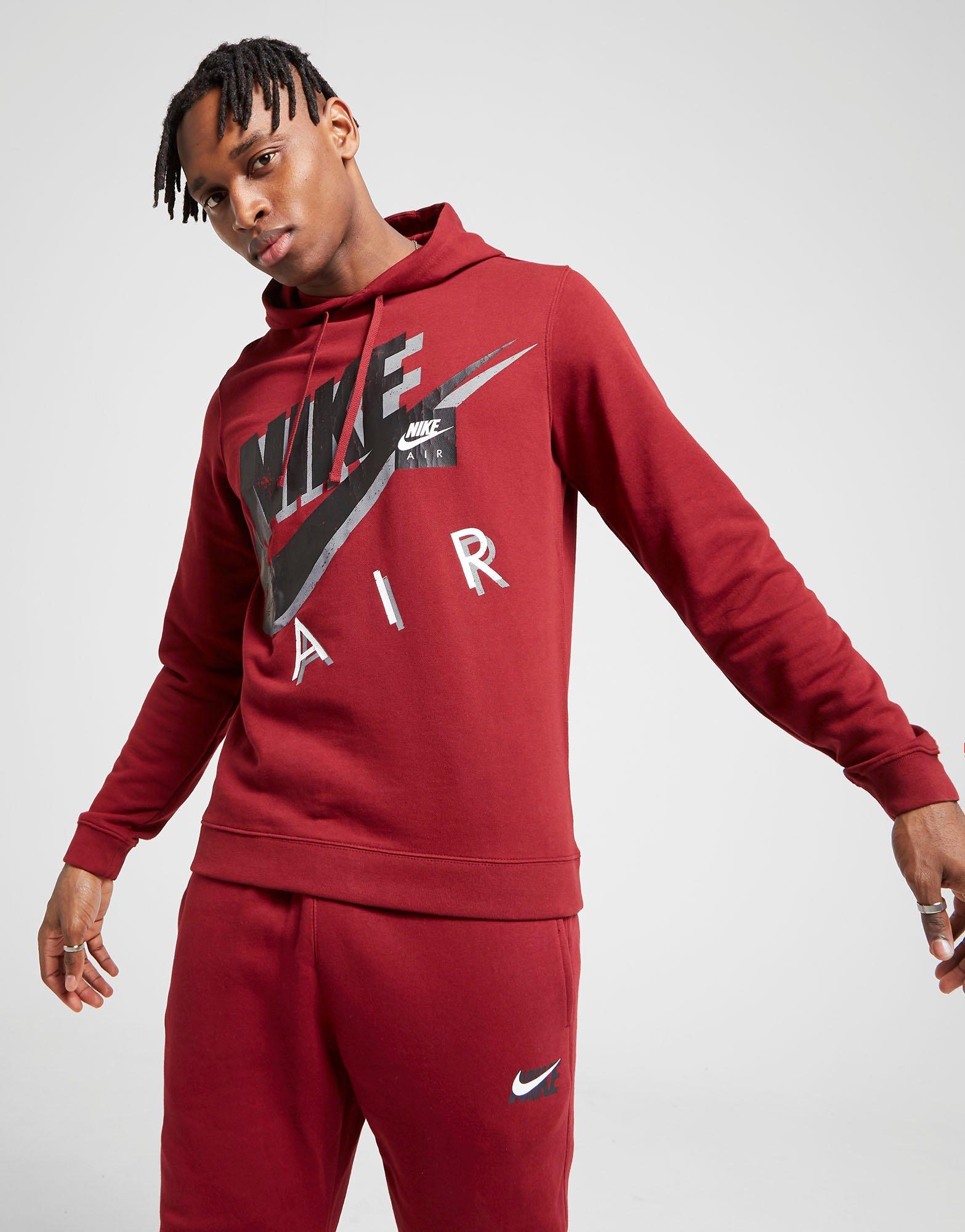 red nike hoodie and sweatpants