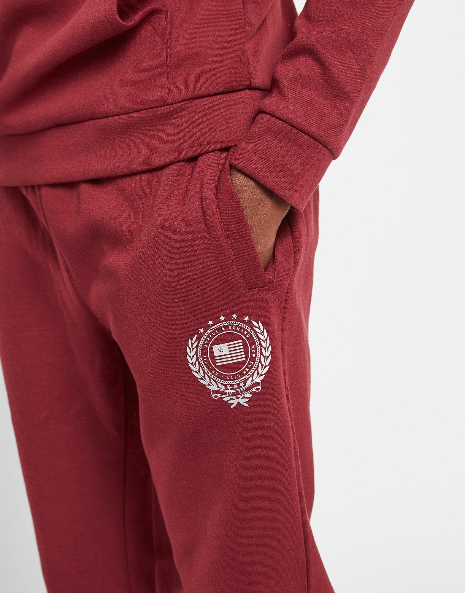 supply and demand red tracksuit