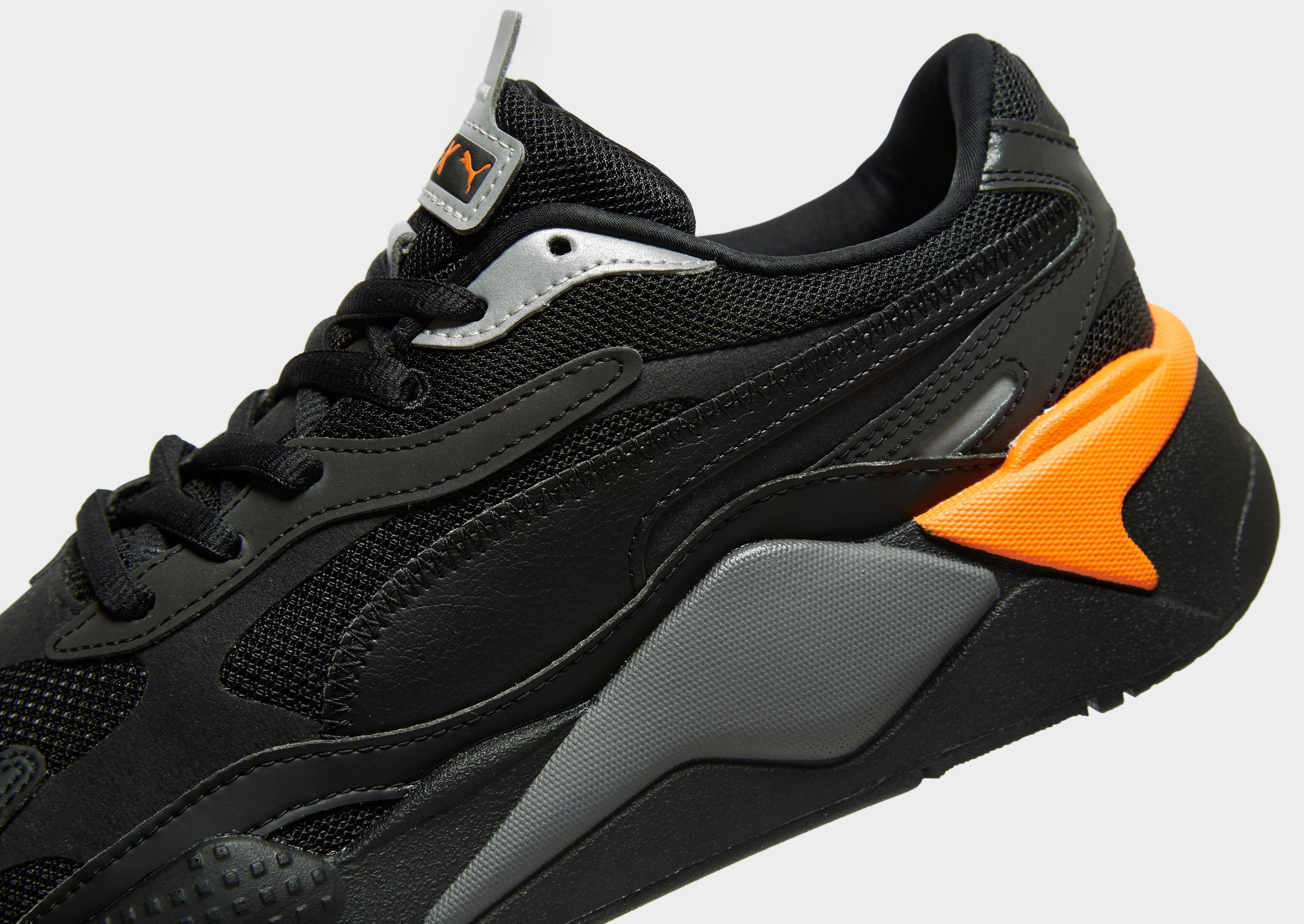 puma fille homme orange