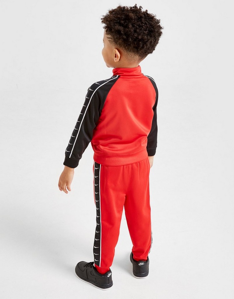 Buy Red Nike Swoosh Tape Tracksuit Children | JD Sports | JD Sports Ireland