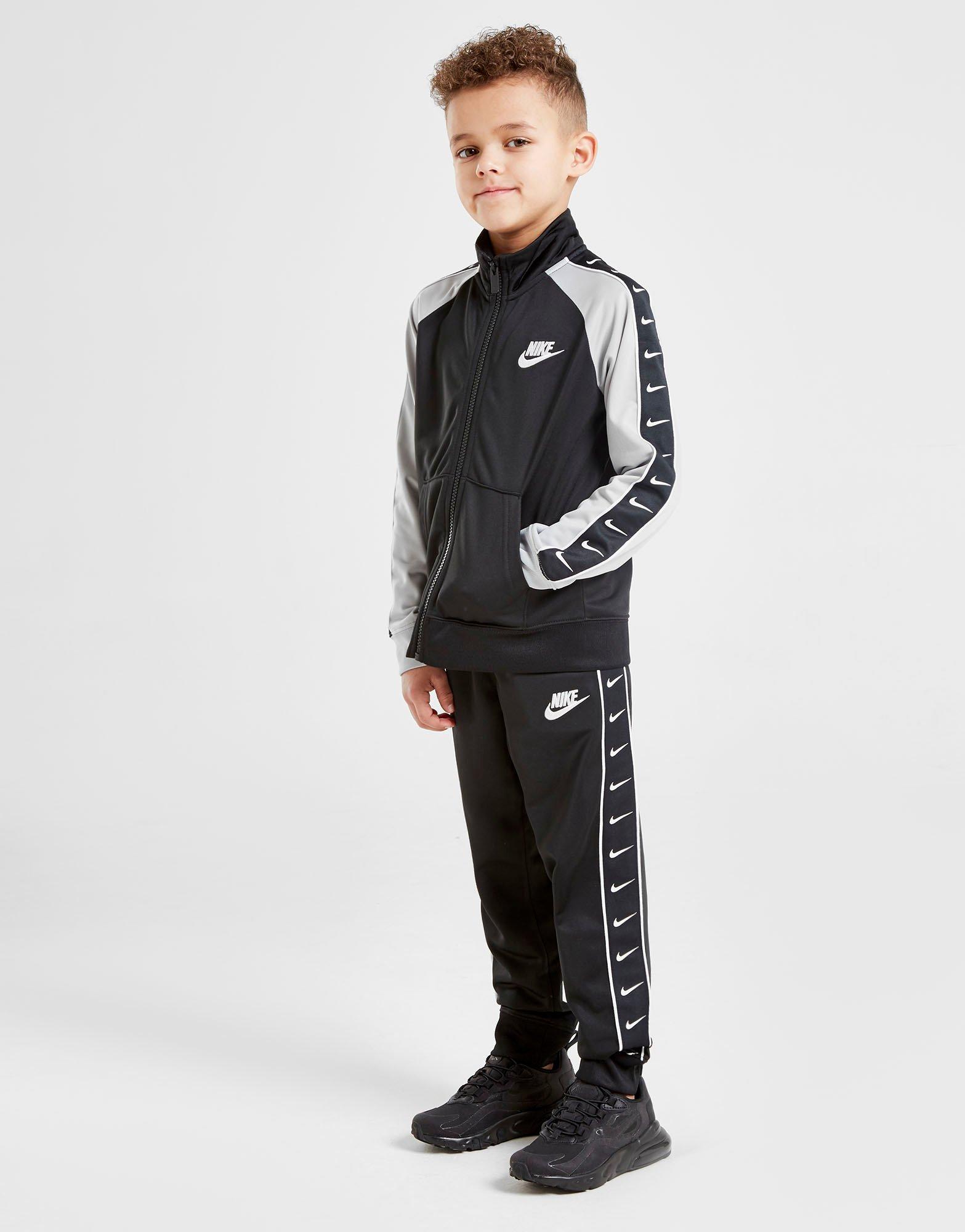 nike taped swoosh tracksuit