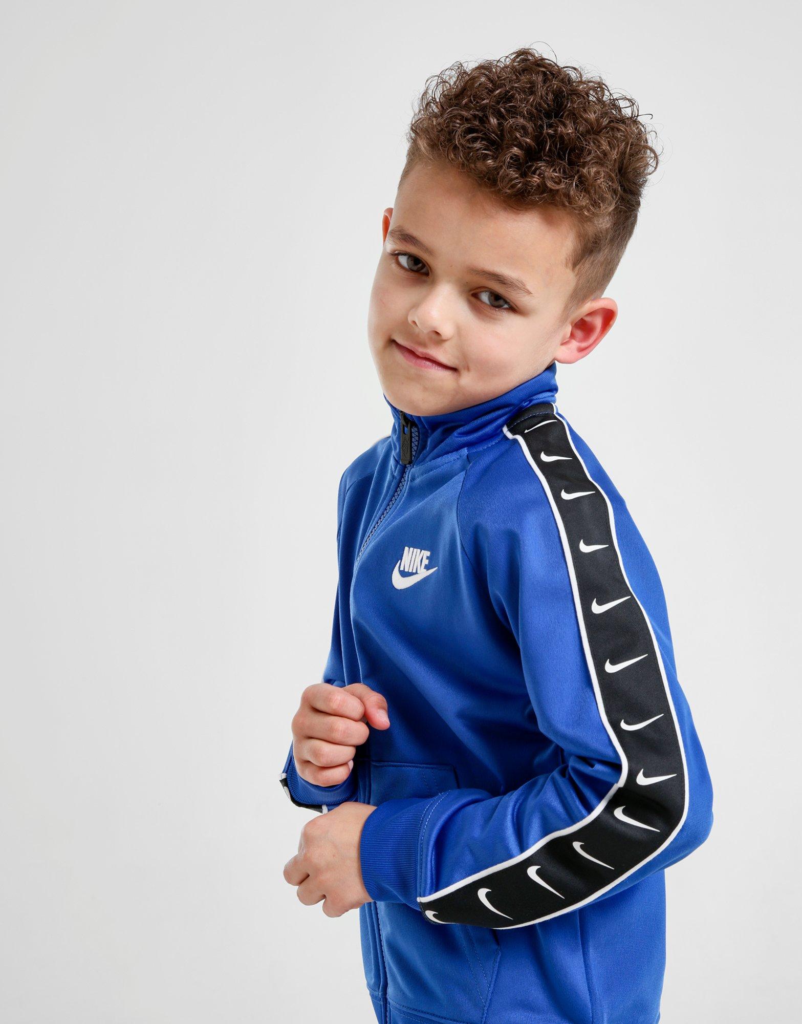 nike swoosh tape tracksuit children