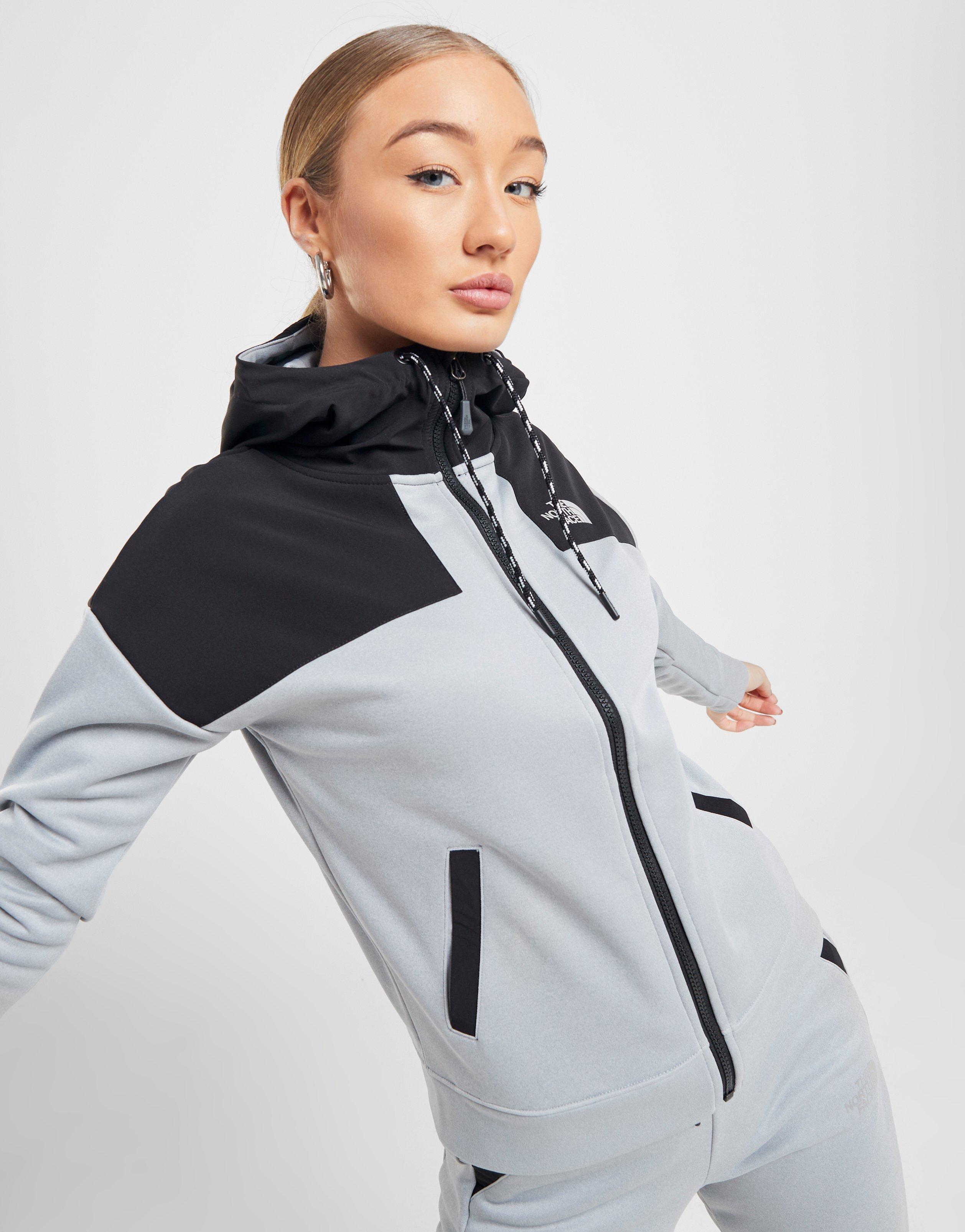 grey north face zip up