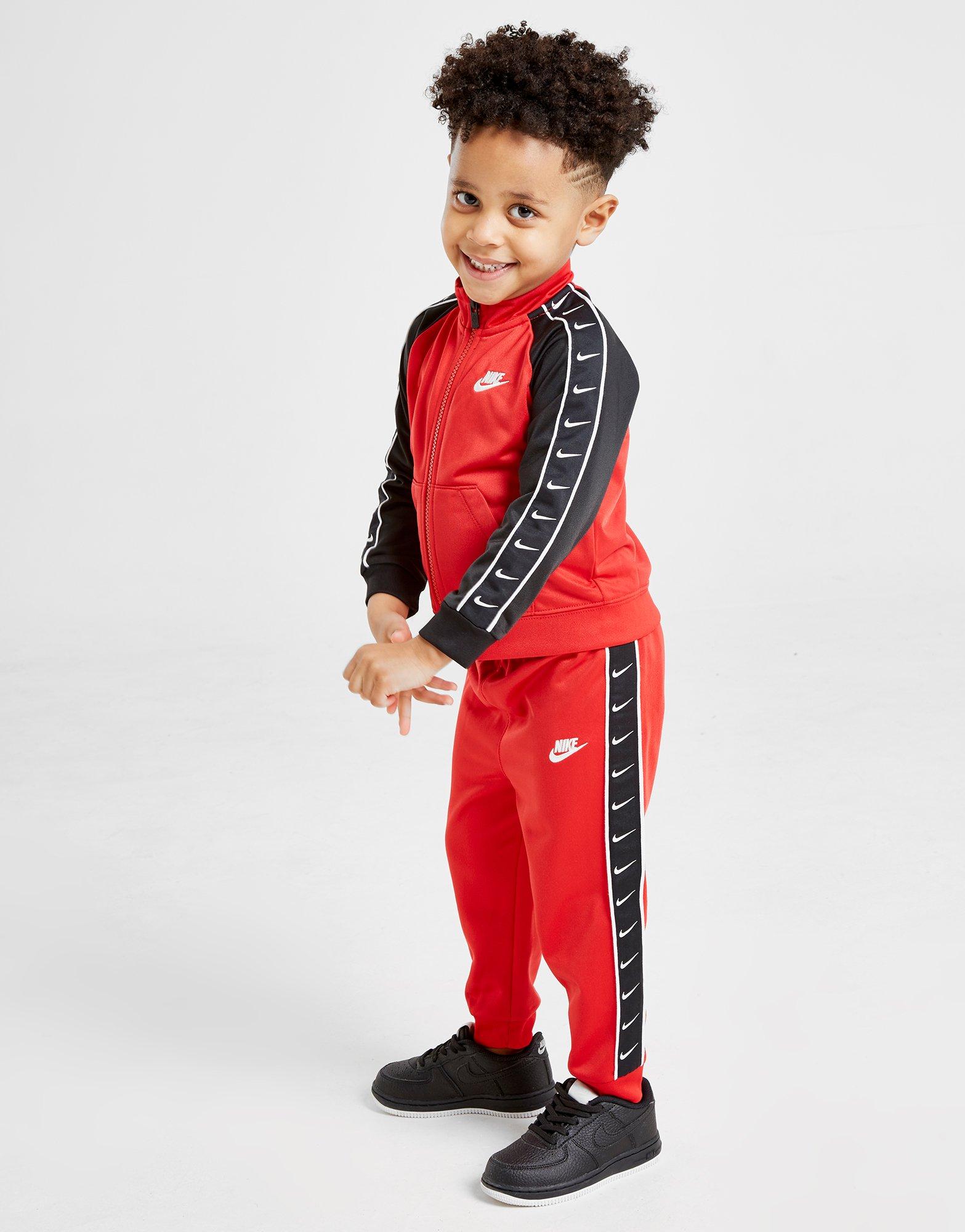 red nike tracksuit boys