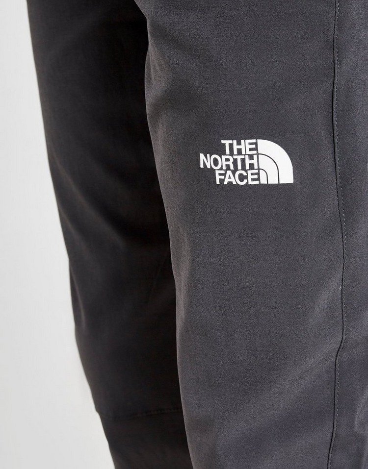 Compra The North Face pantalón de chándal Esker Woven júnior en Gris