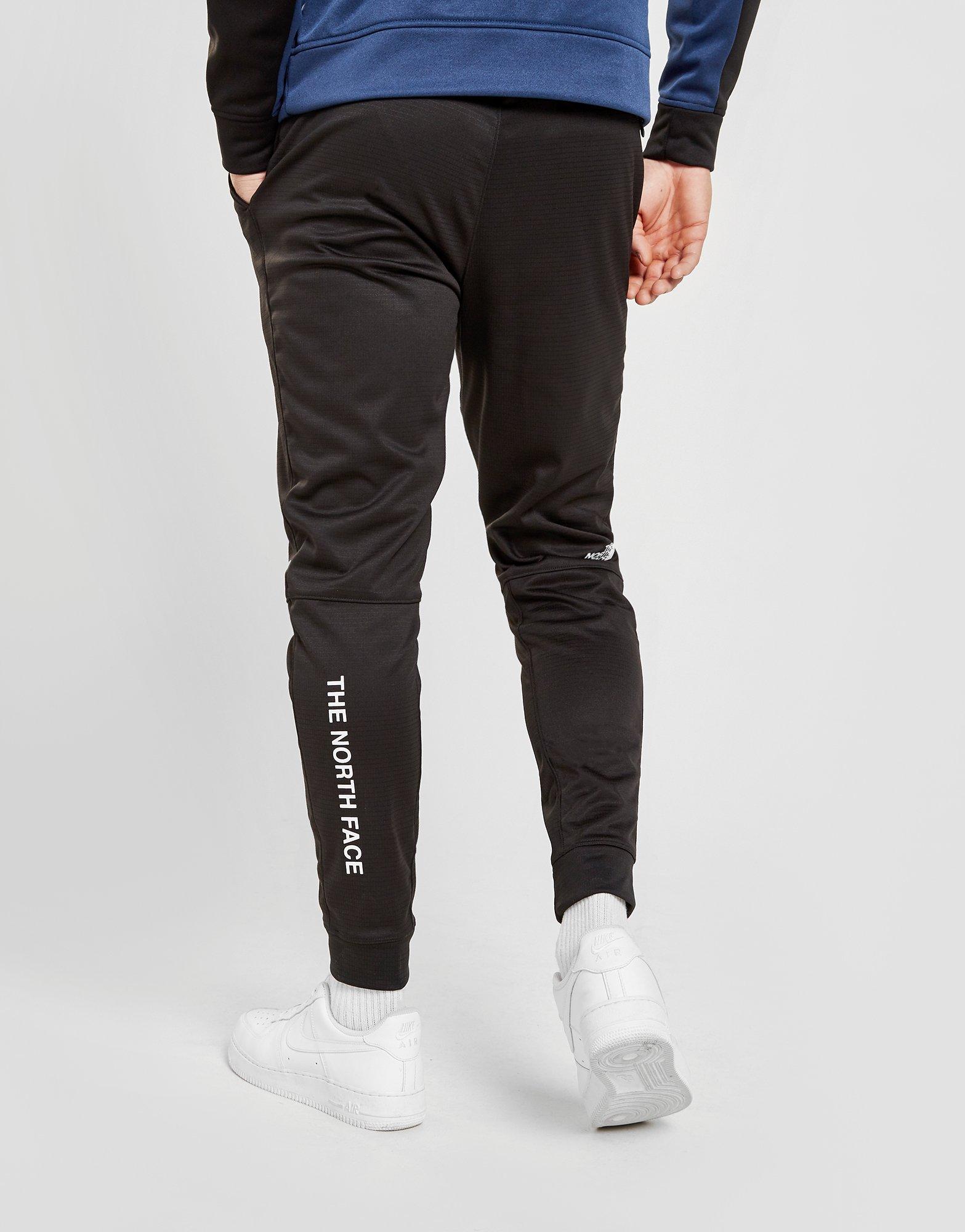 the north face train n logo track pants