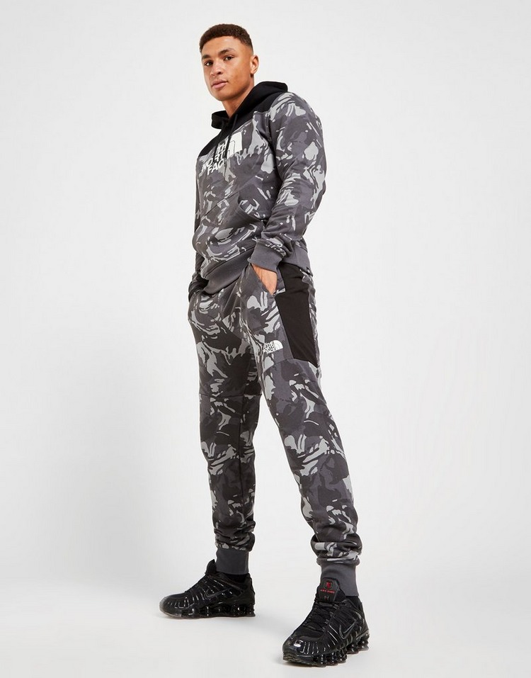 Buy Black The North Face Fleece All Over Print Camo Track Pants | JD ...