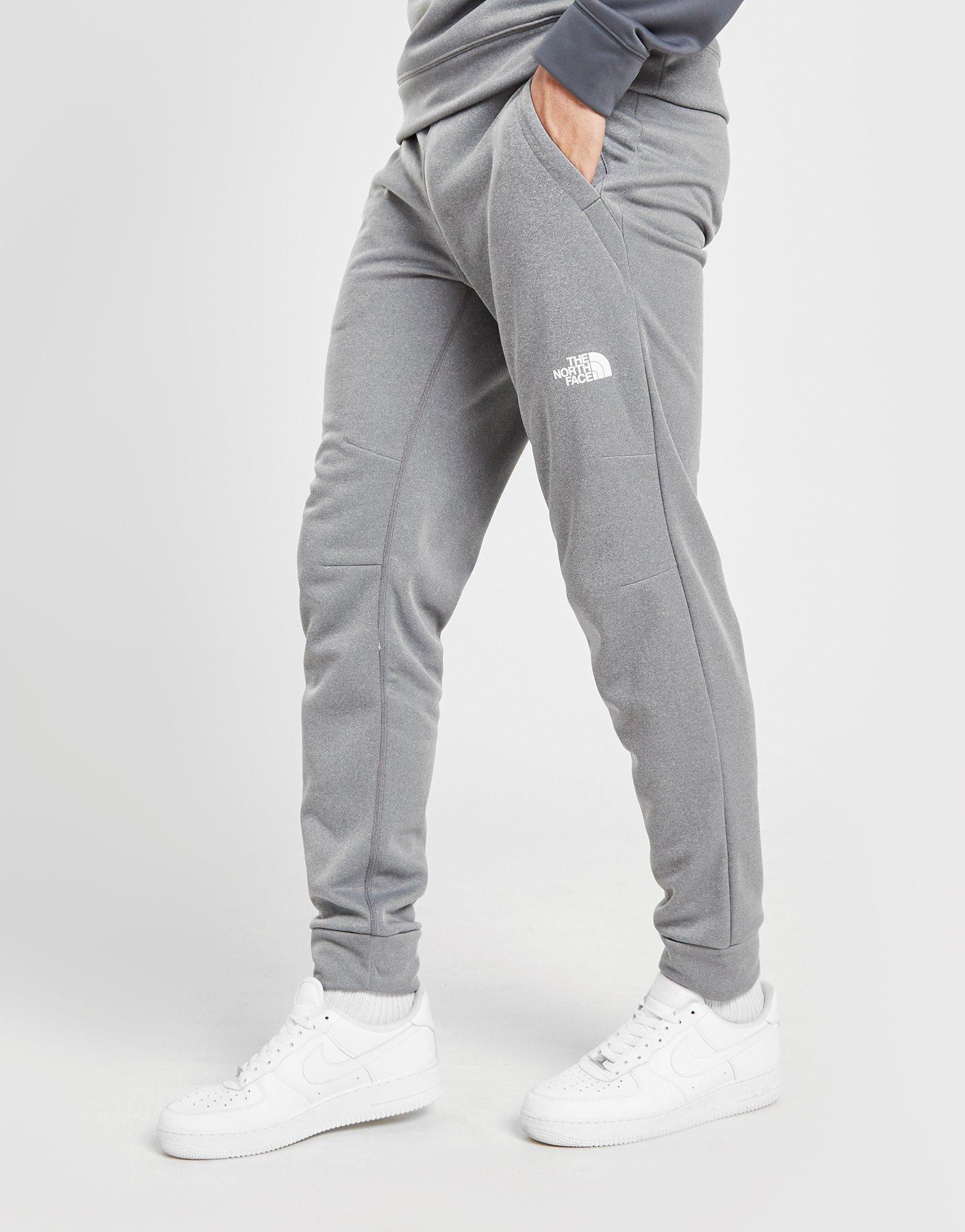 grey north face track pants