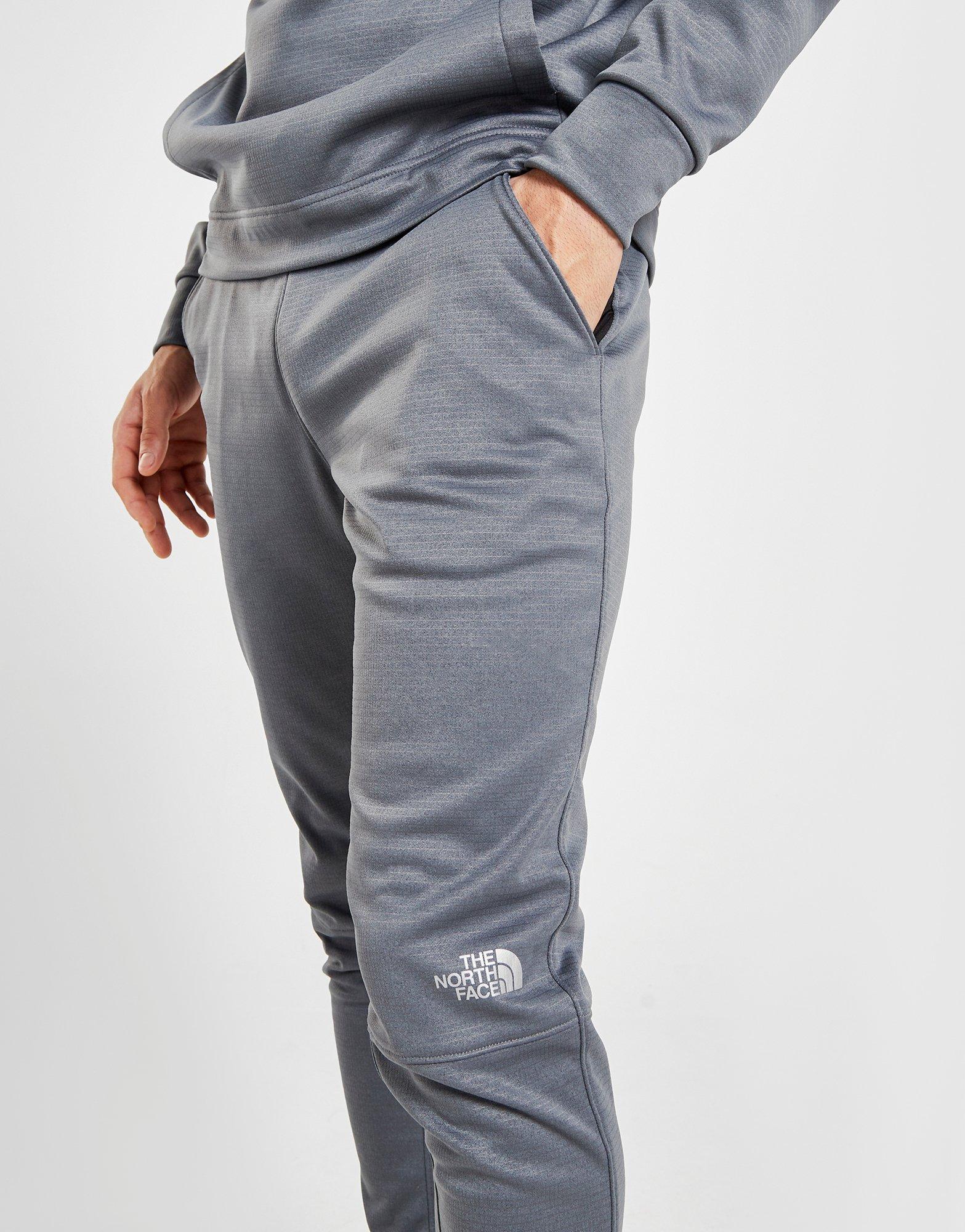 grey north face track pants