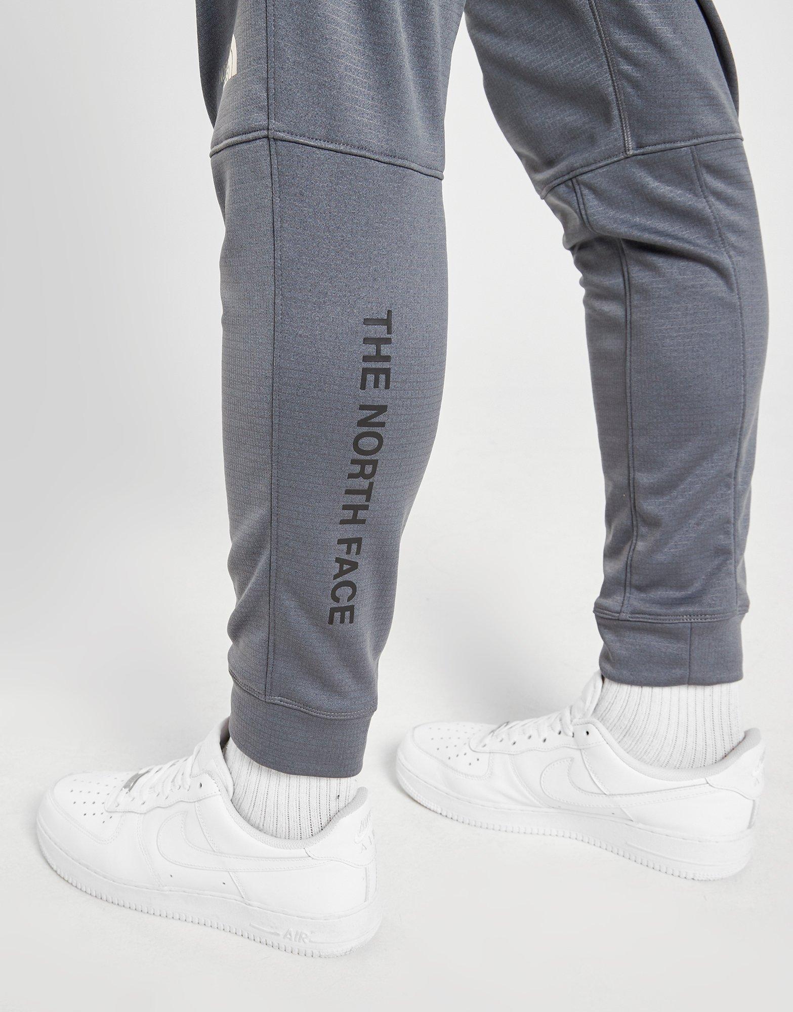 the north face train n logo track pants