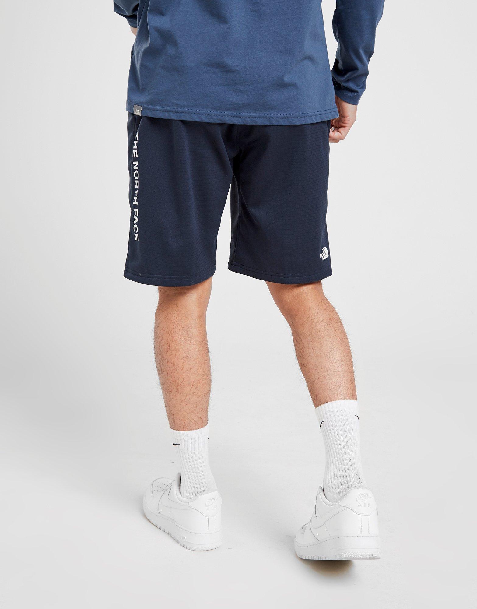 the north face train n logo shorts
