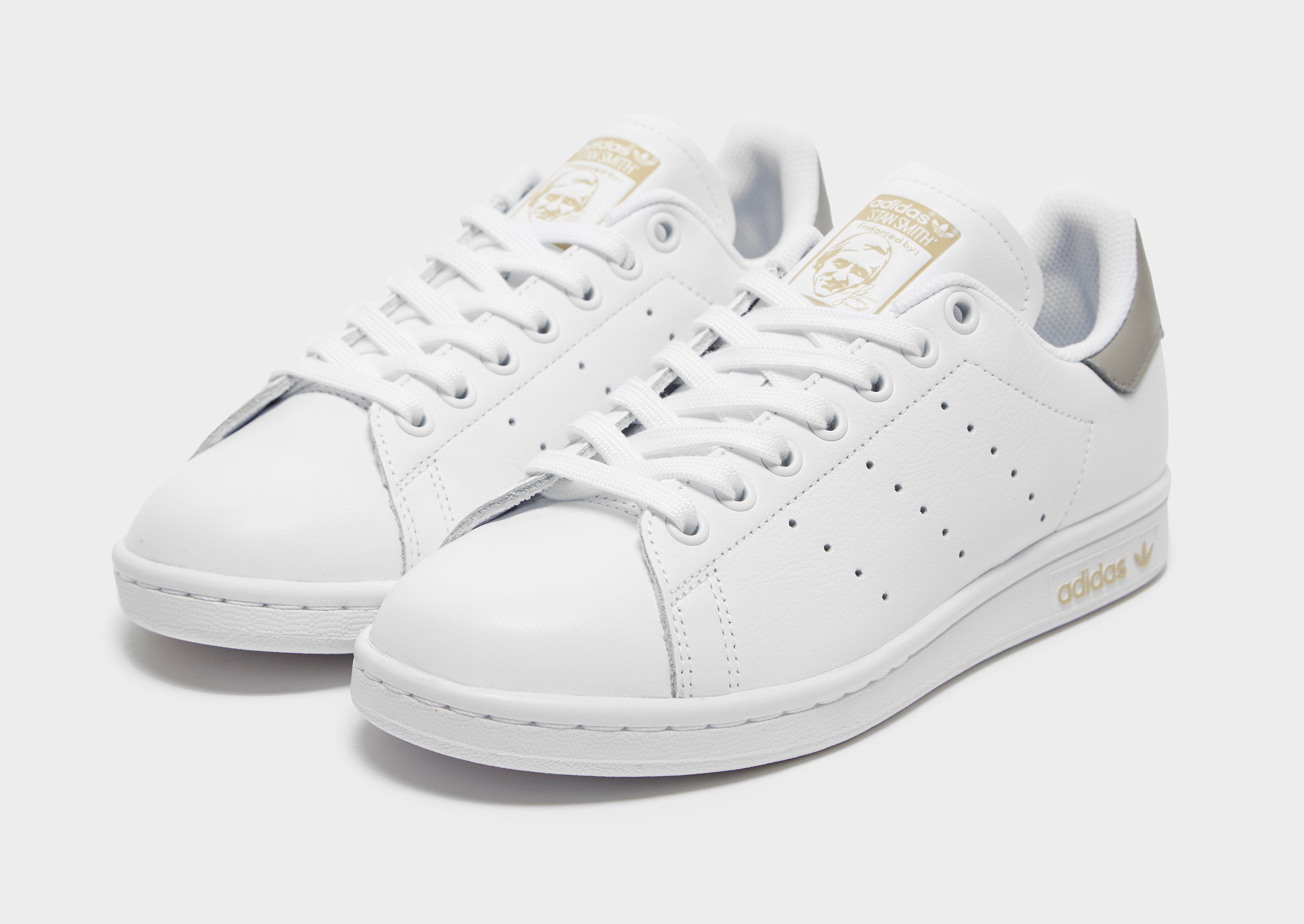 stan smith femme blanche et or