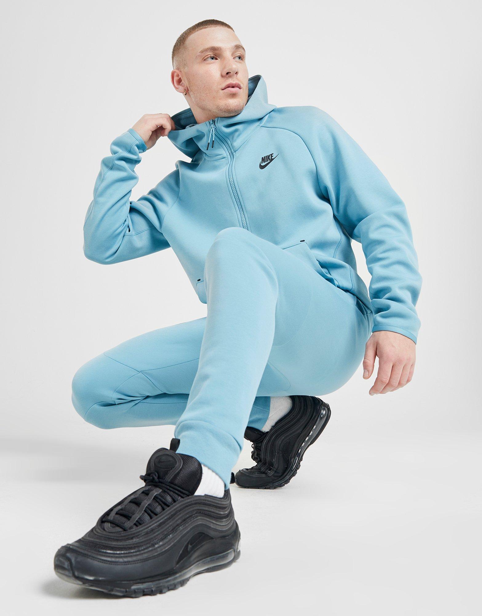 blue nike tech tracksuit