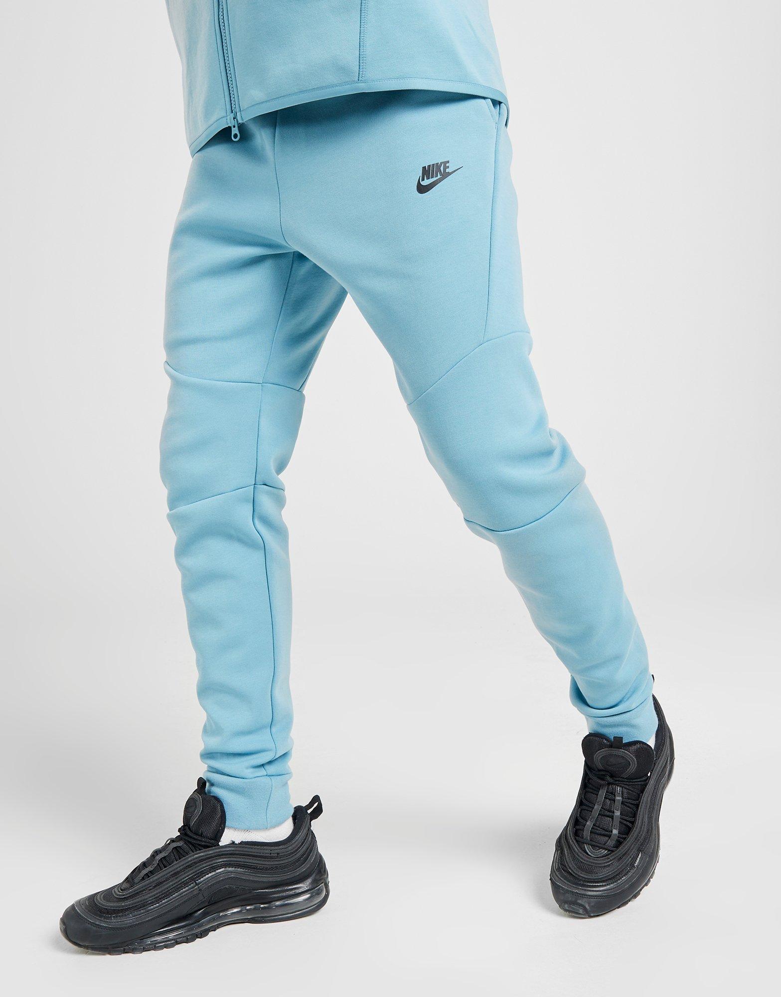 light blue nike tech pants