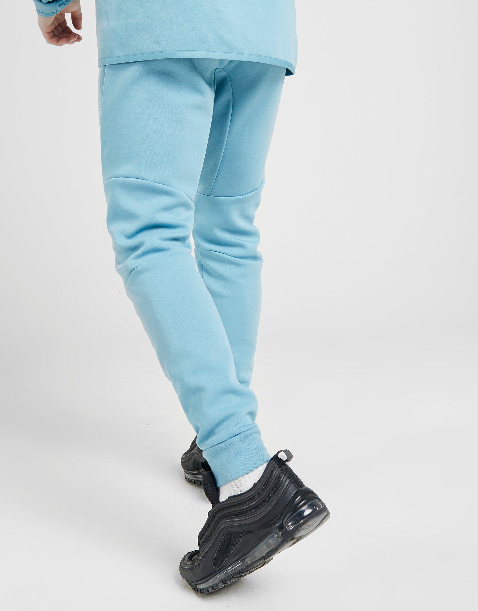 nike tech fleece pants light grey