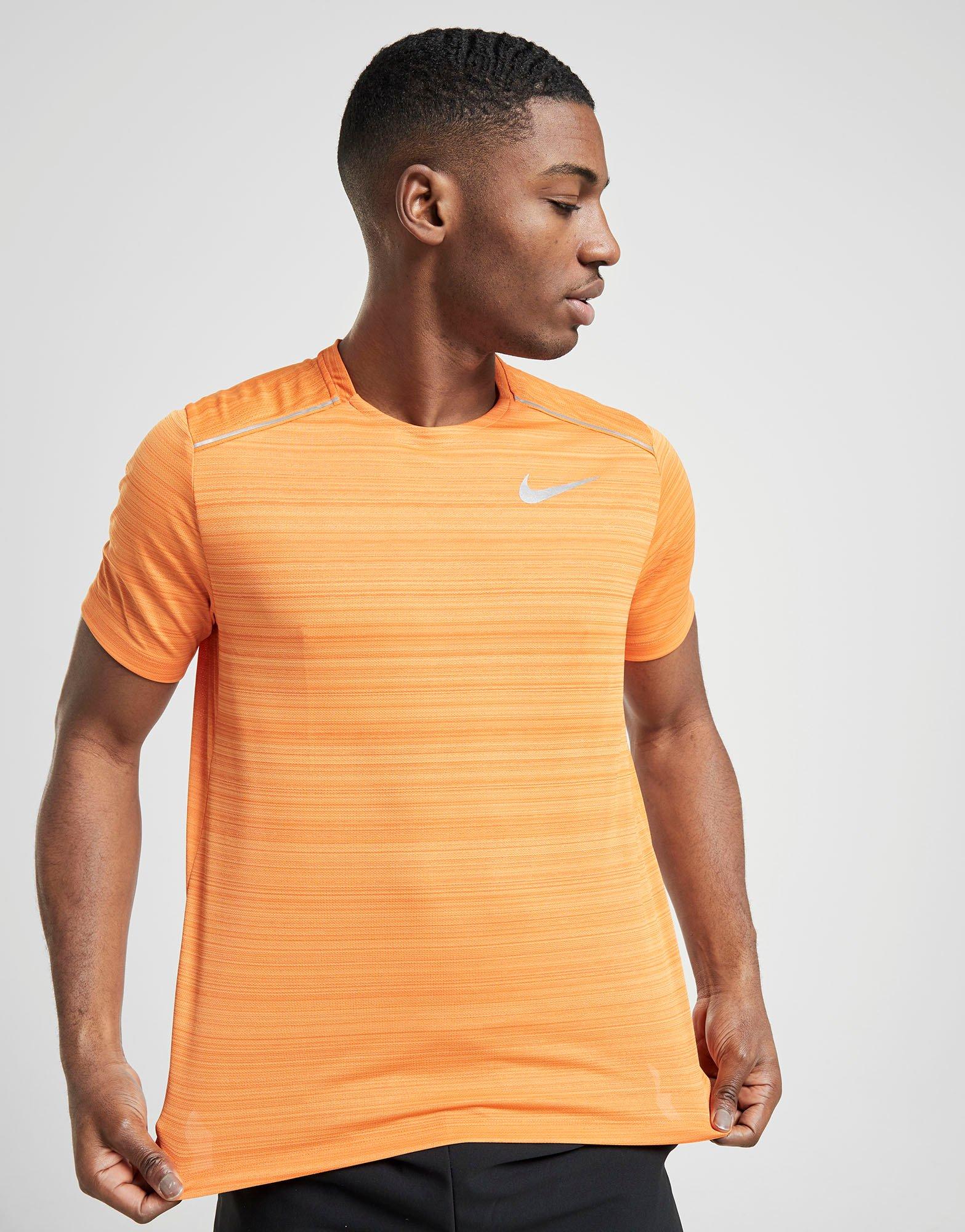 orange nike top