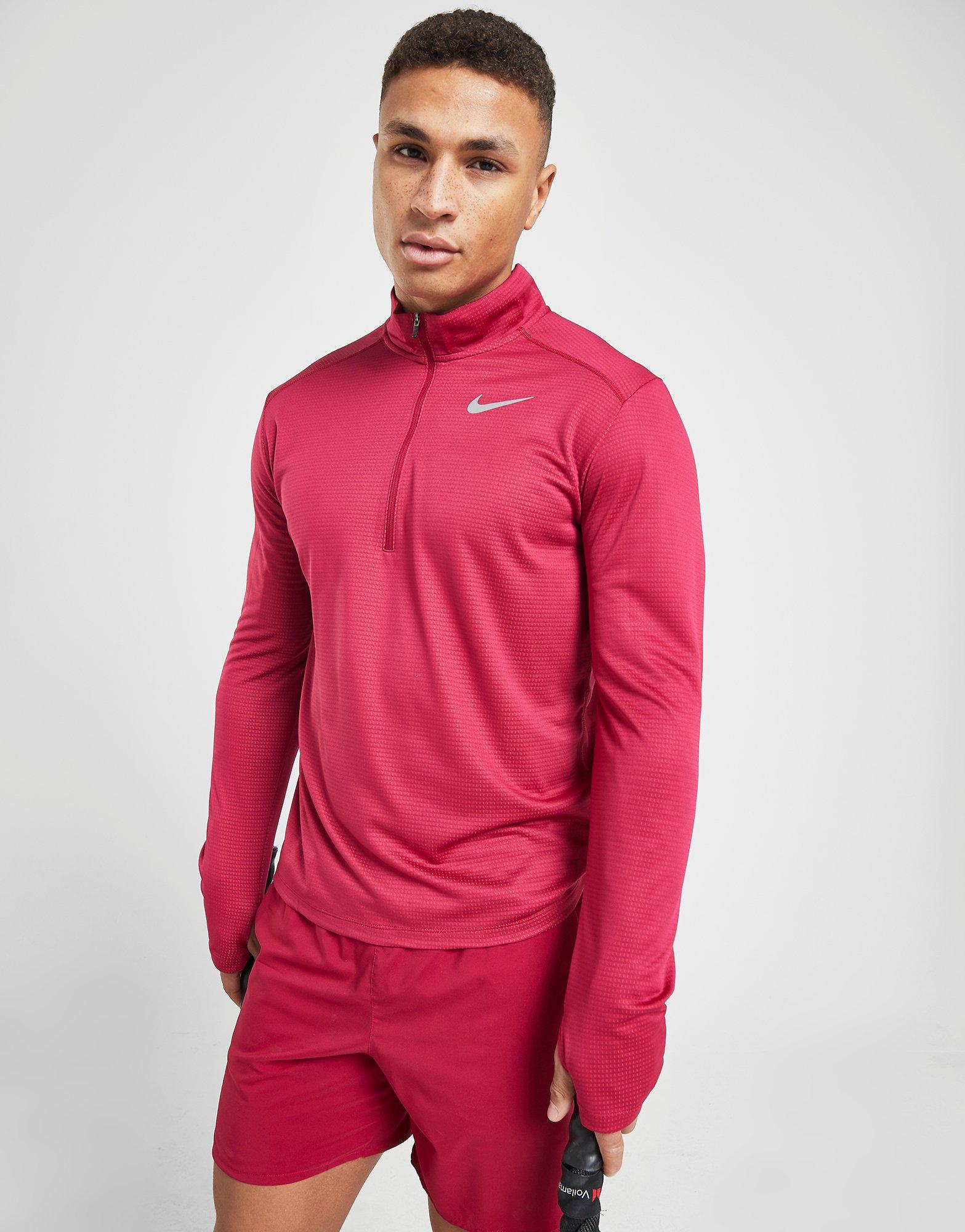 red nike tracksuit top