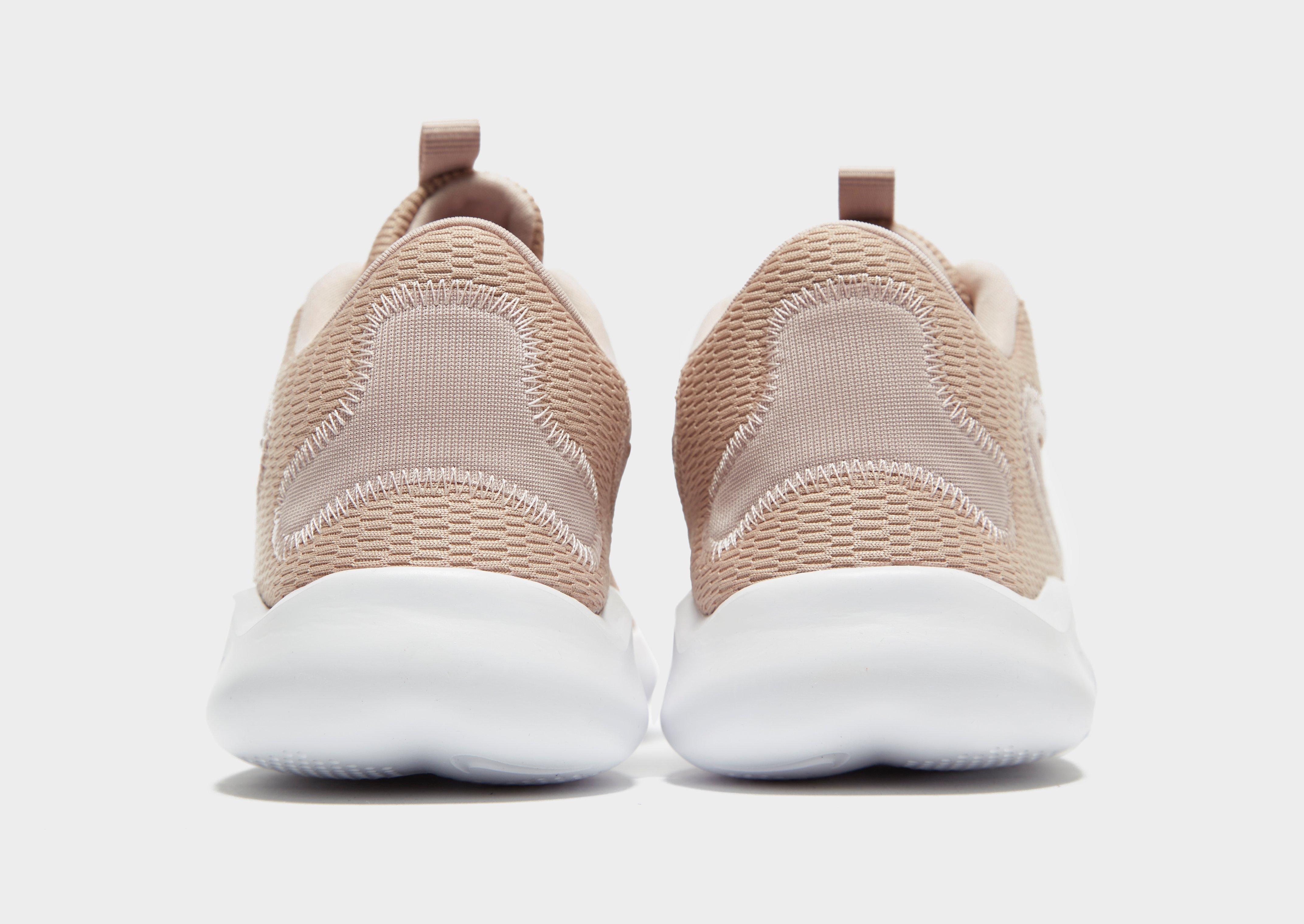 nike running flex experience 9 trainers in pink