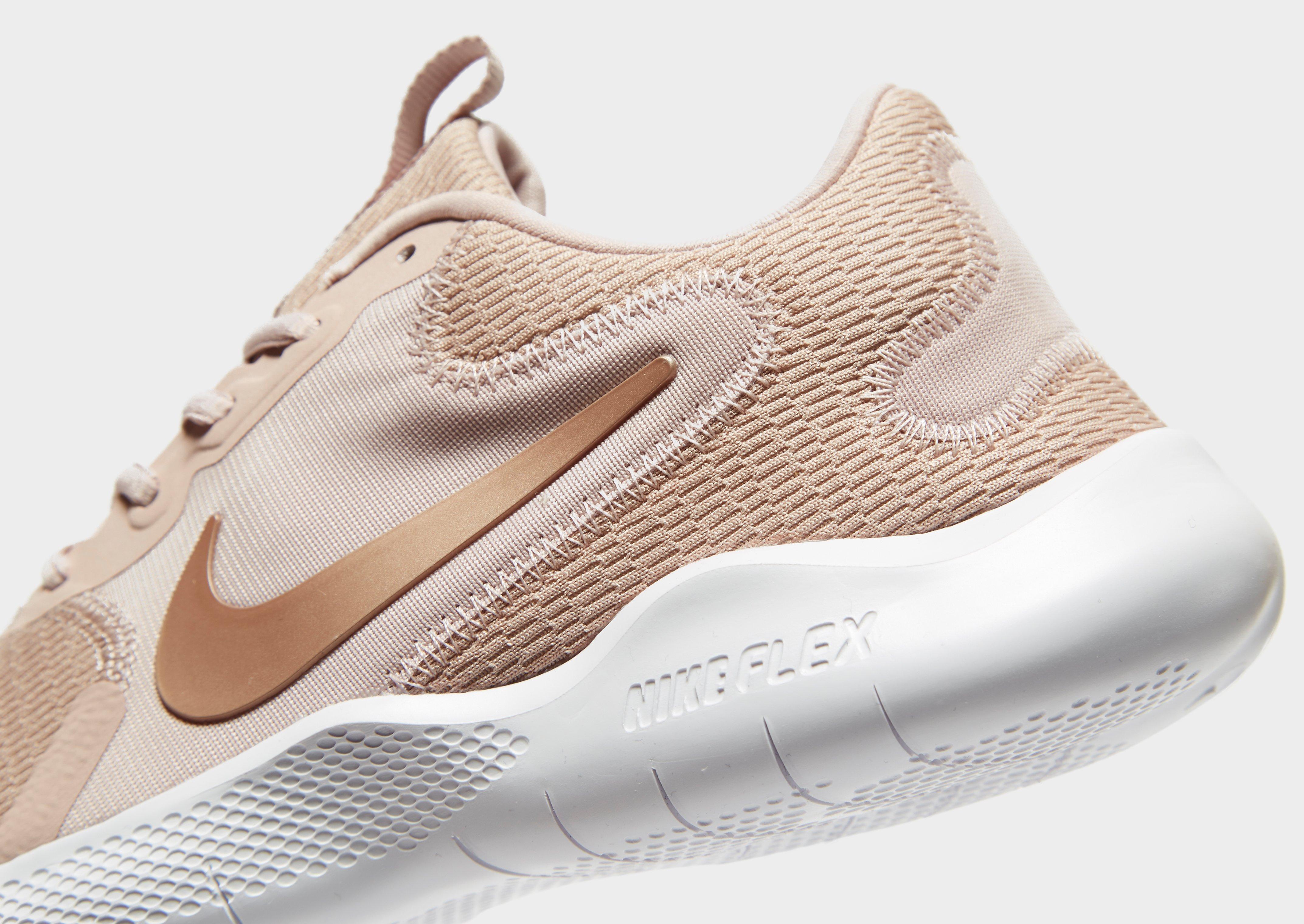 nike flex experience run 9 beige