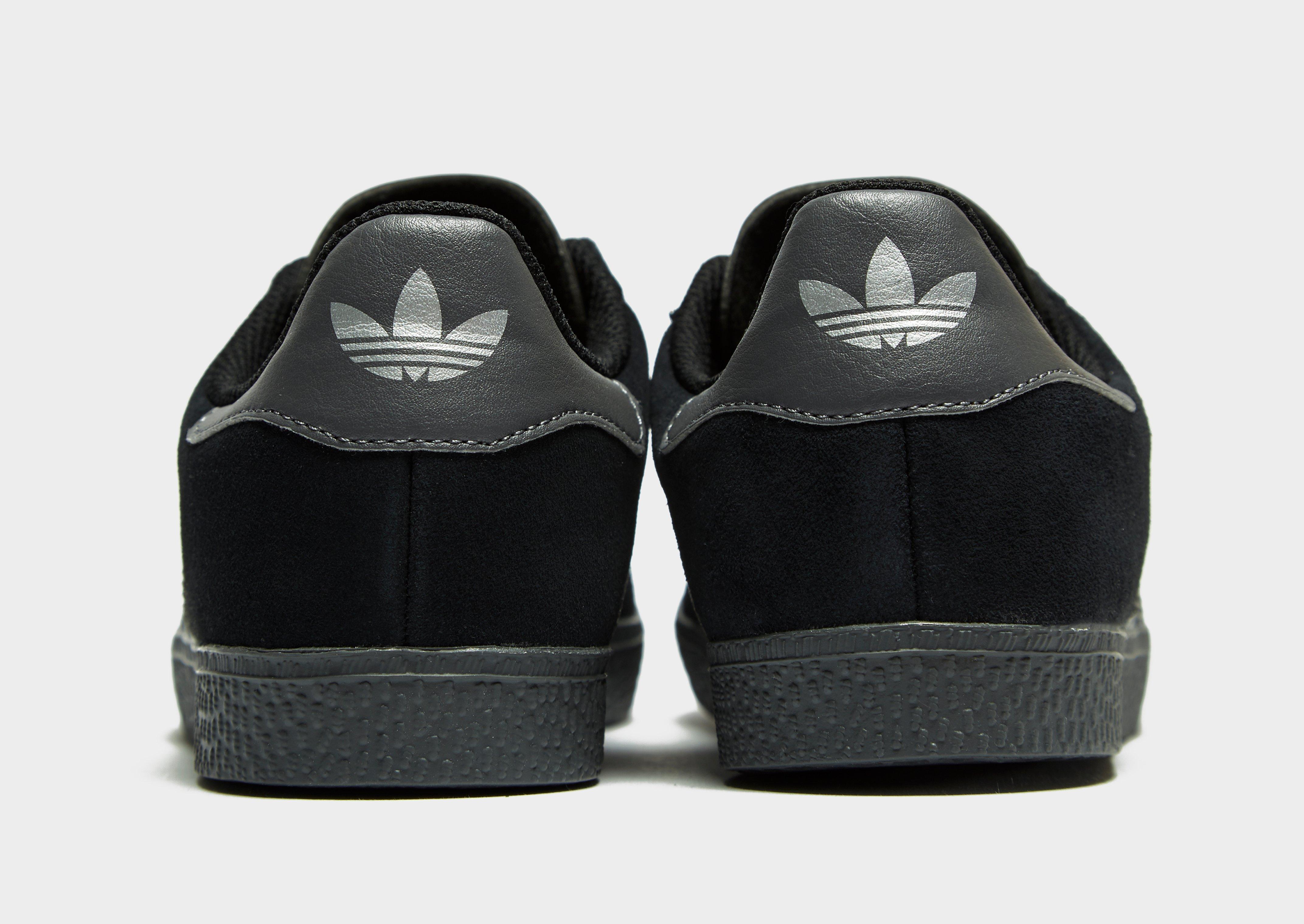 black leather adidas gazelle junior