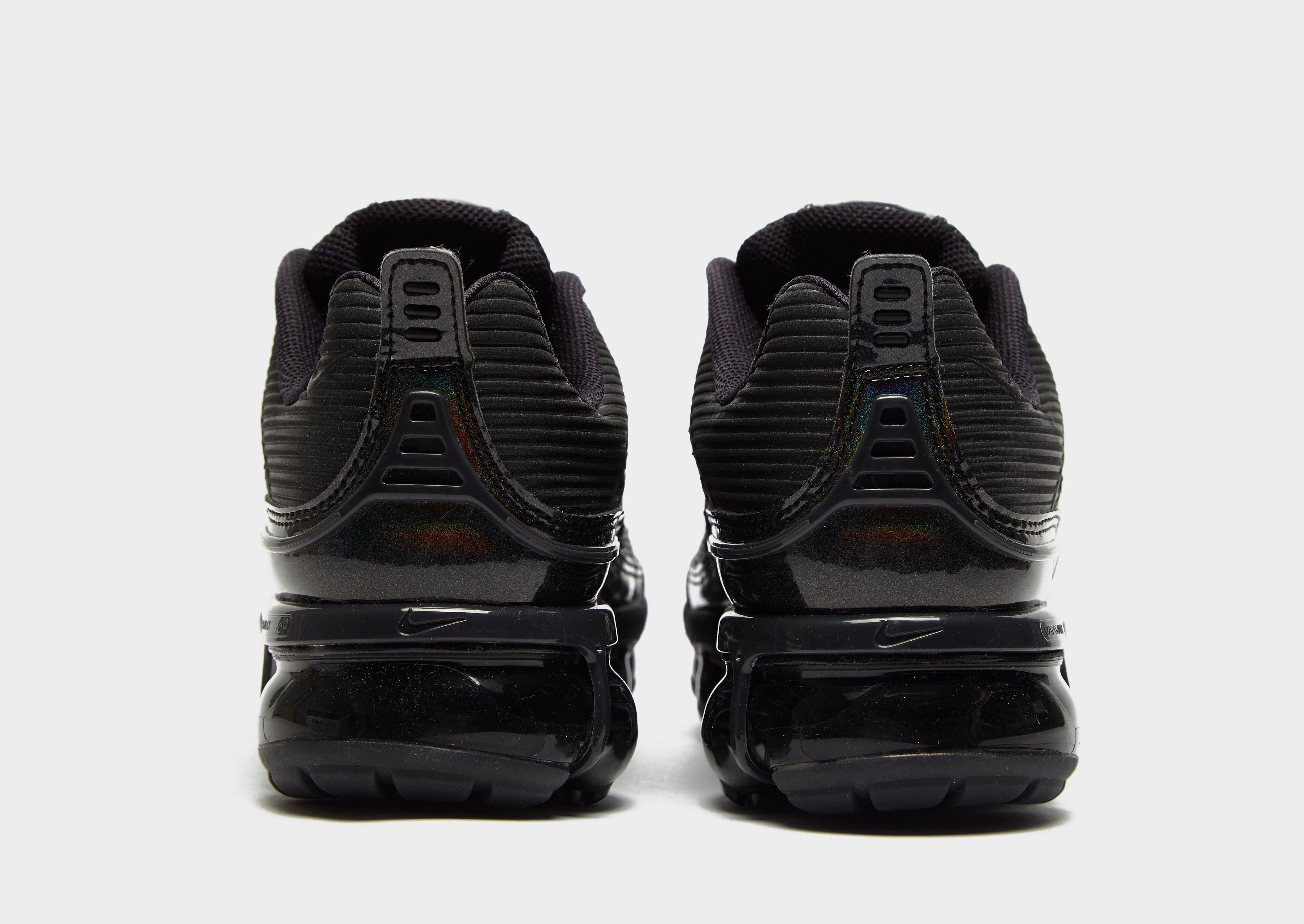 vapormax black with white tick