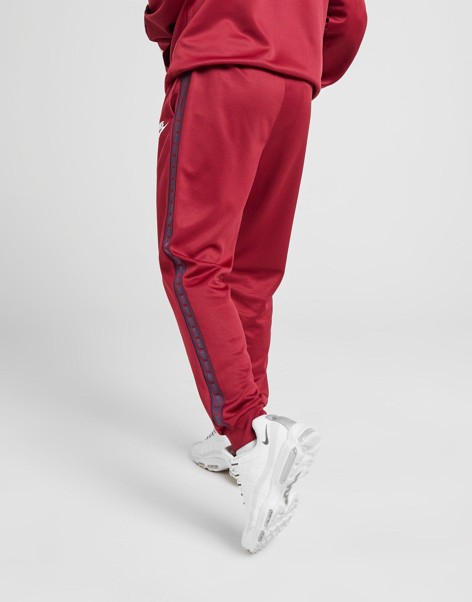 burgundy nike track pants