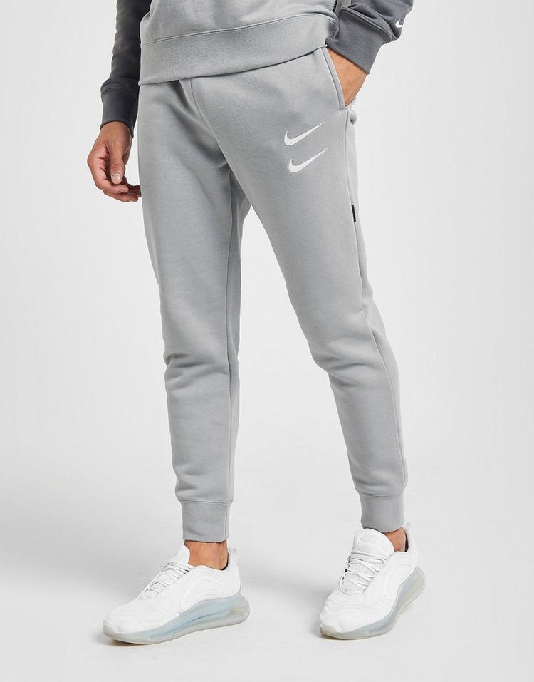 Buy Grey Nike Double Swoosh Joggers | JD Sports | JD Sports Ireland