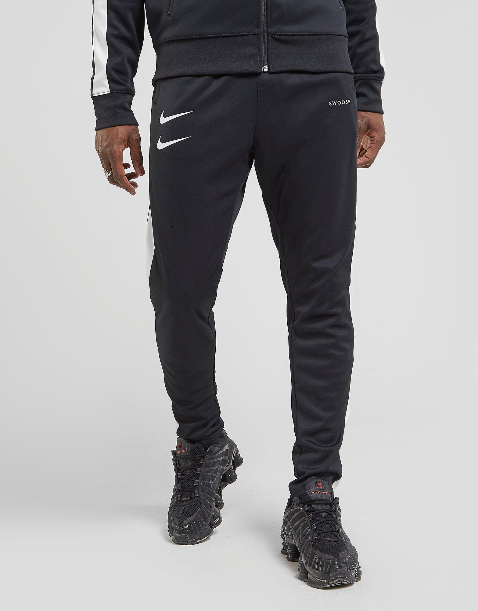 nike track pants double swoosh