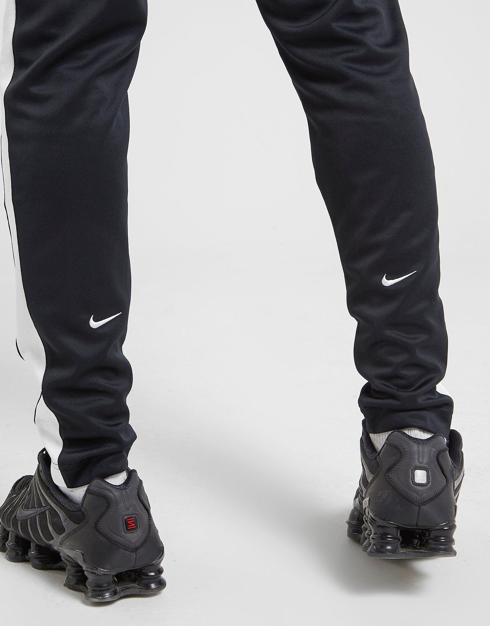 nike tribute poly track pants