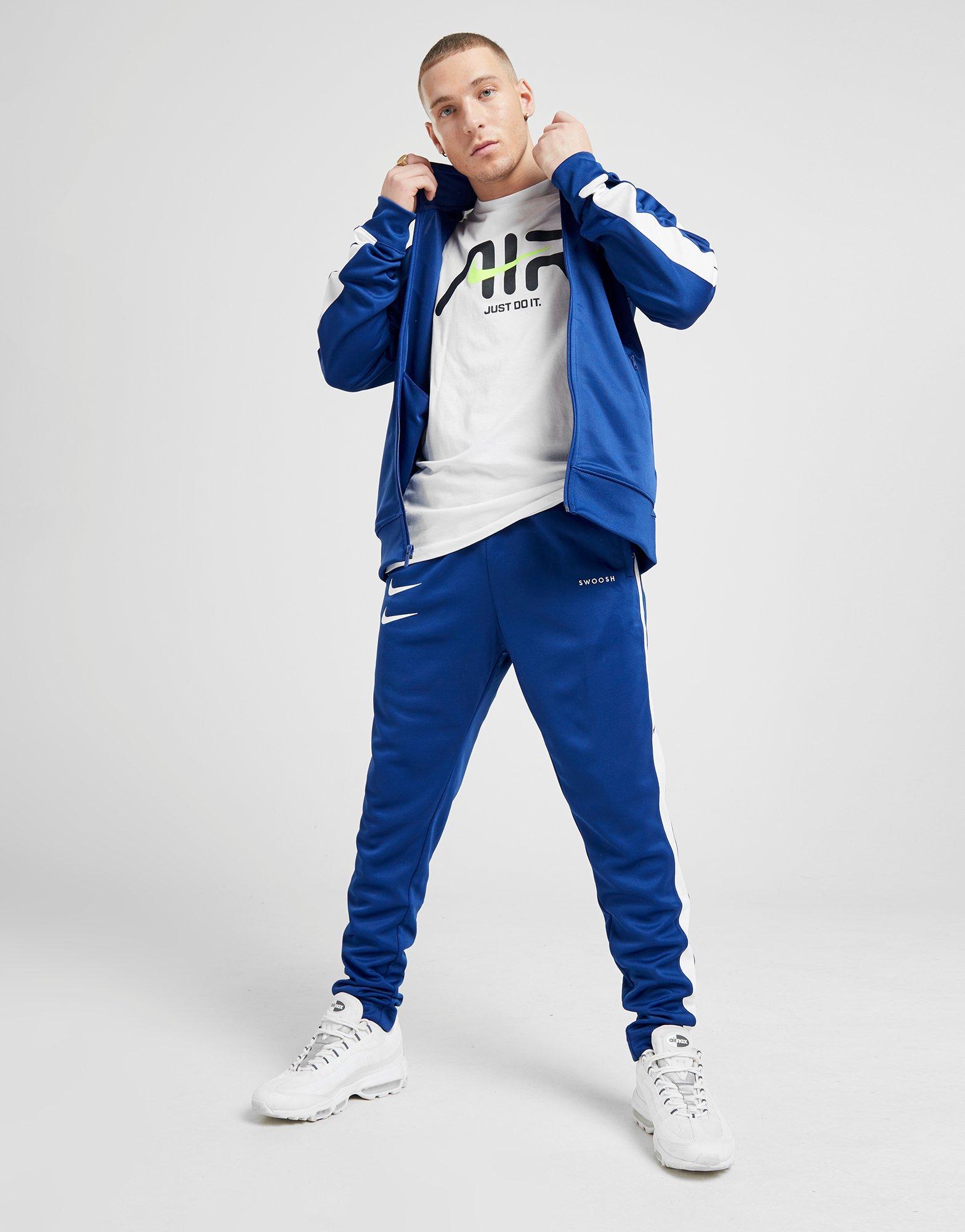 nike swoosh logo tracksuit