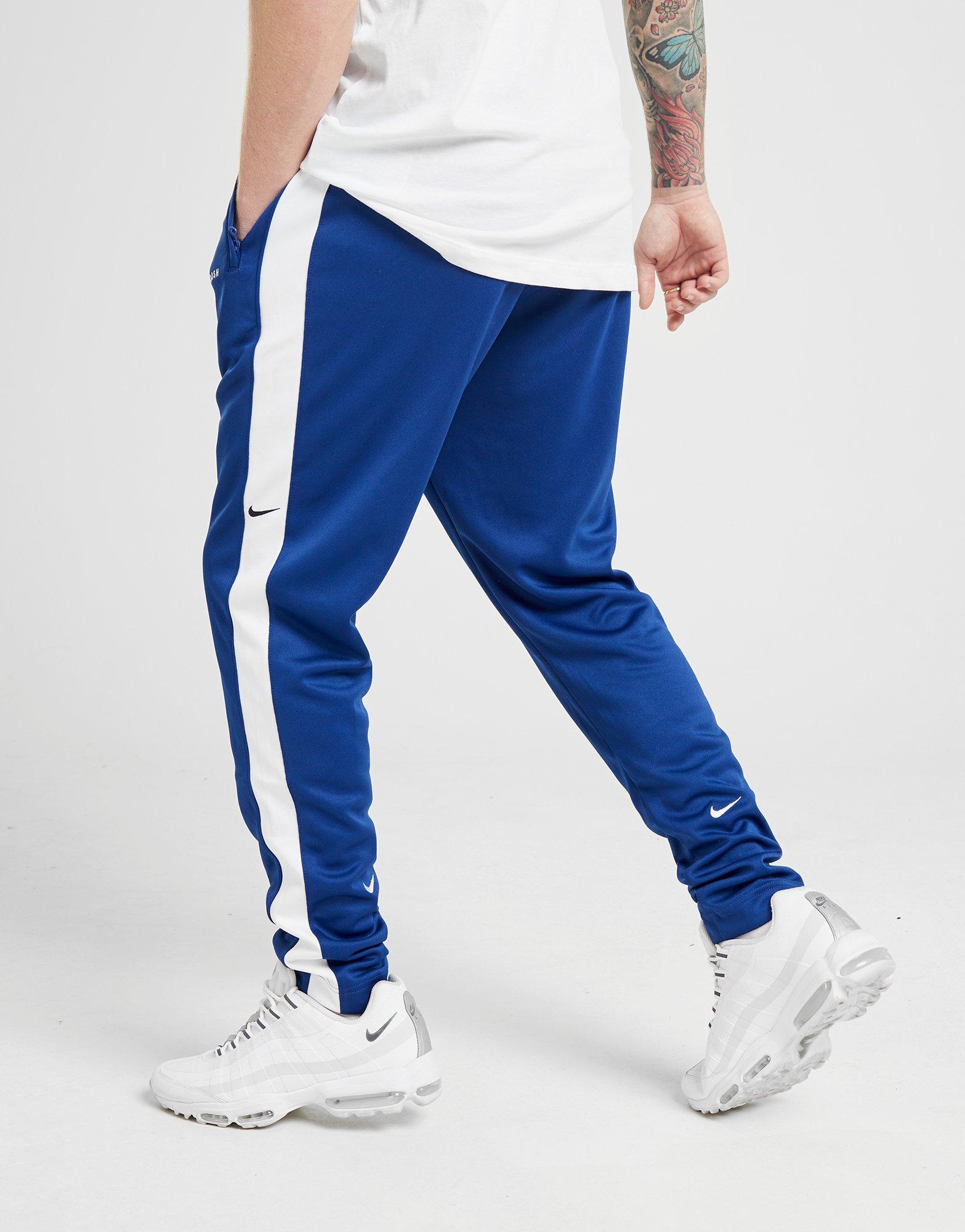 nike swoosh tracksuit blue