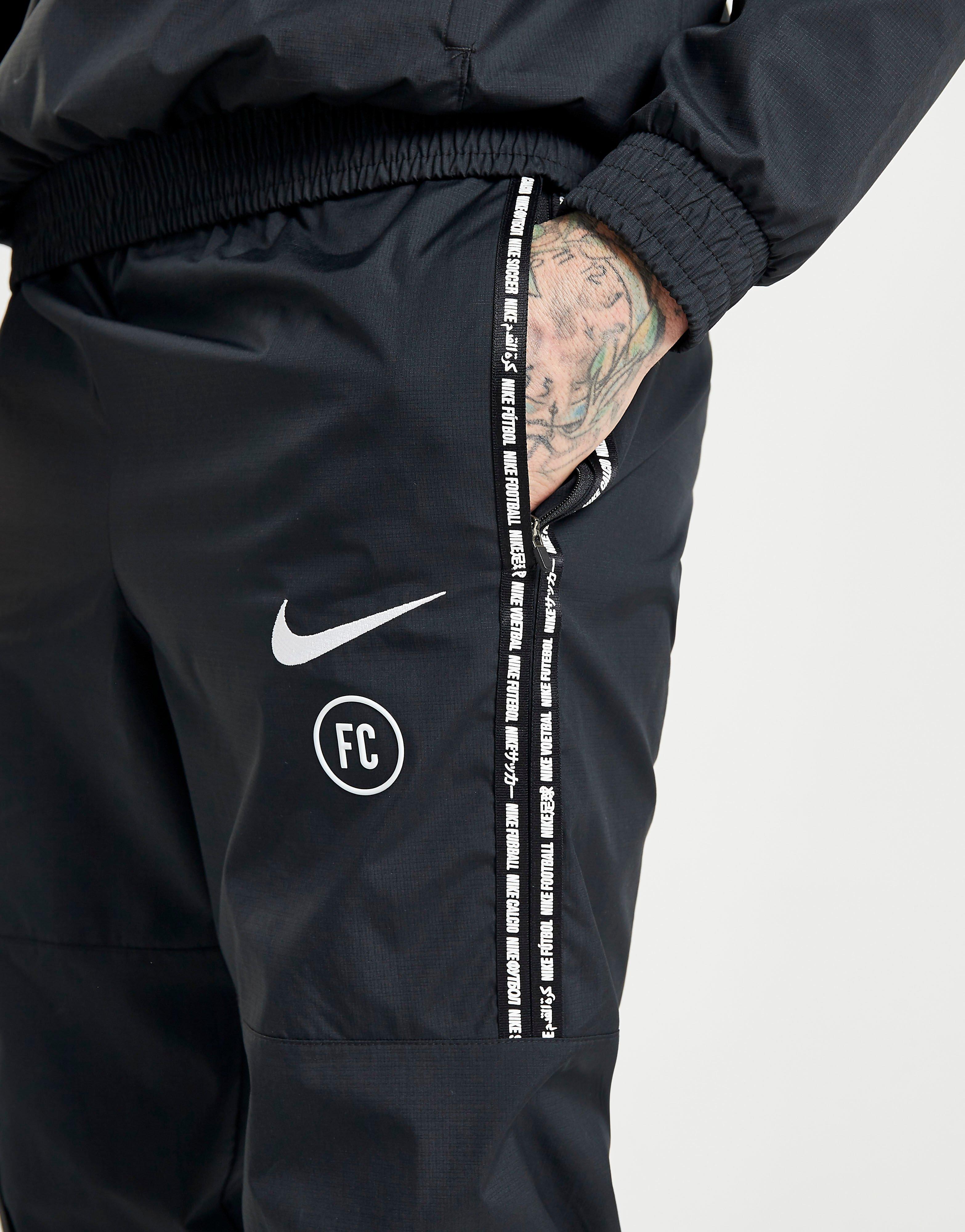 nike track pants t90