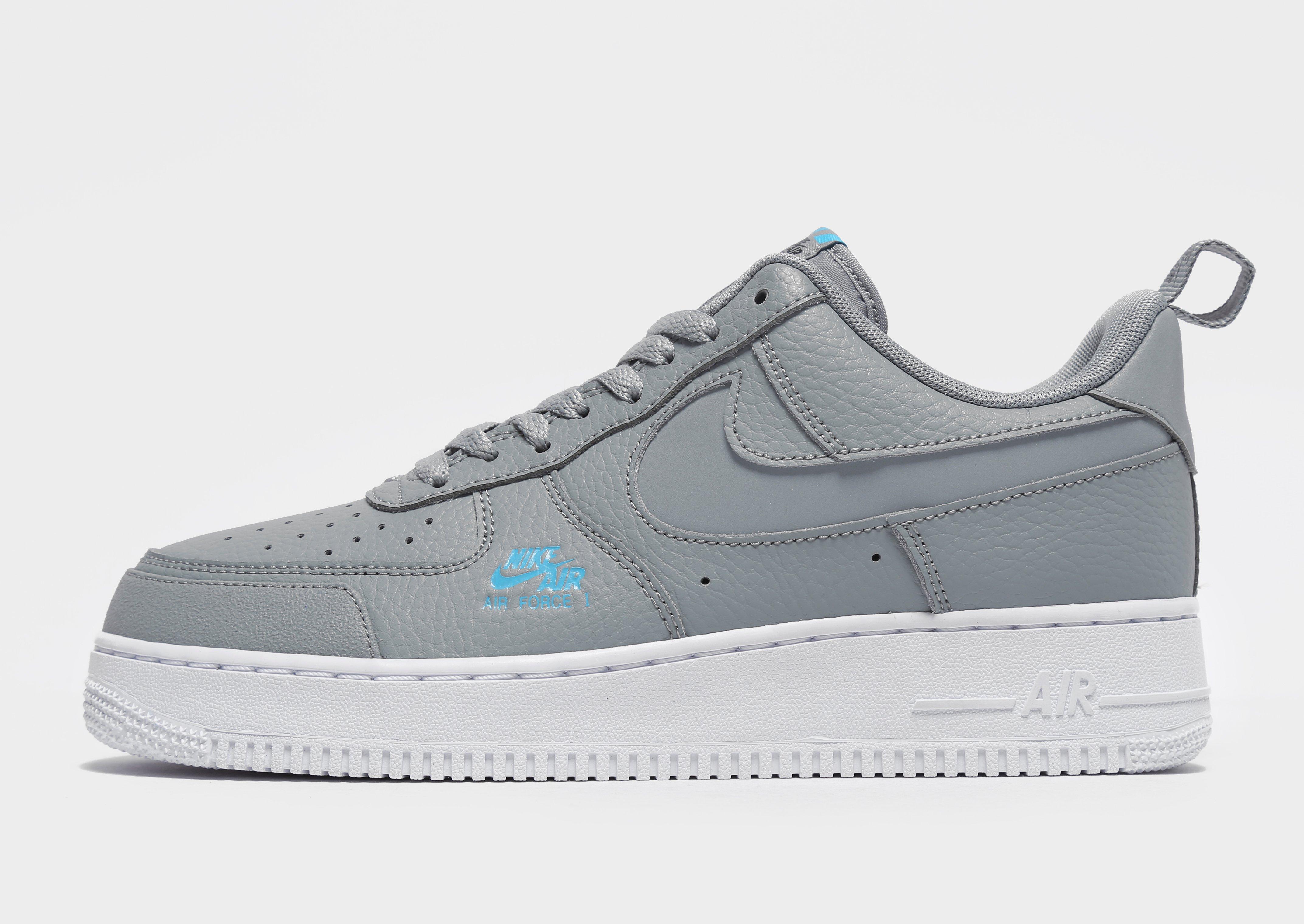 gray and blue air force ones