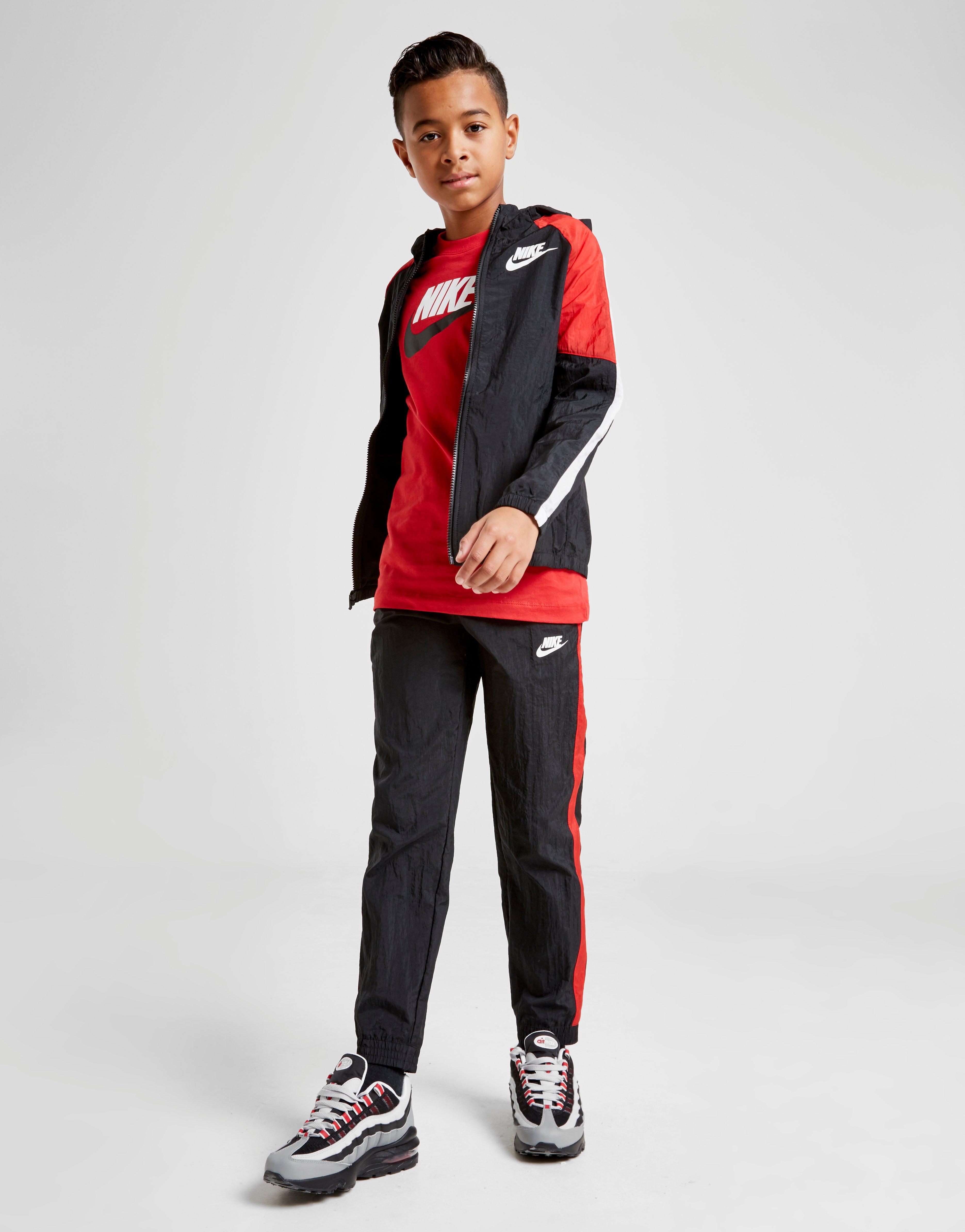 nike woven tracksuit junior