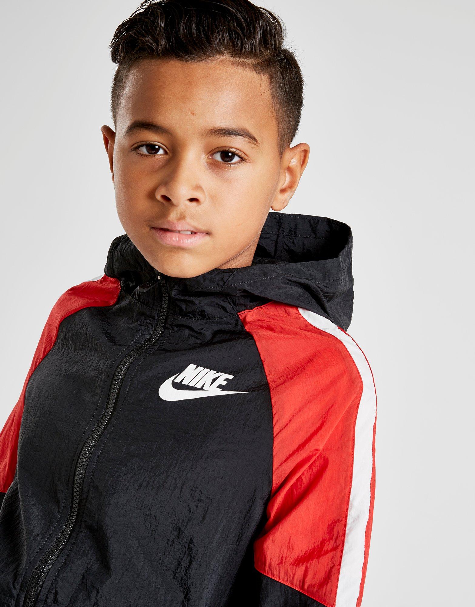 nike woven tracksuit junior